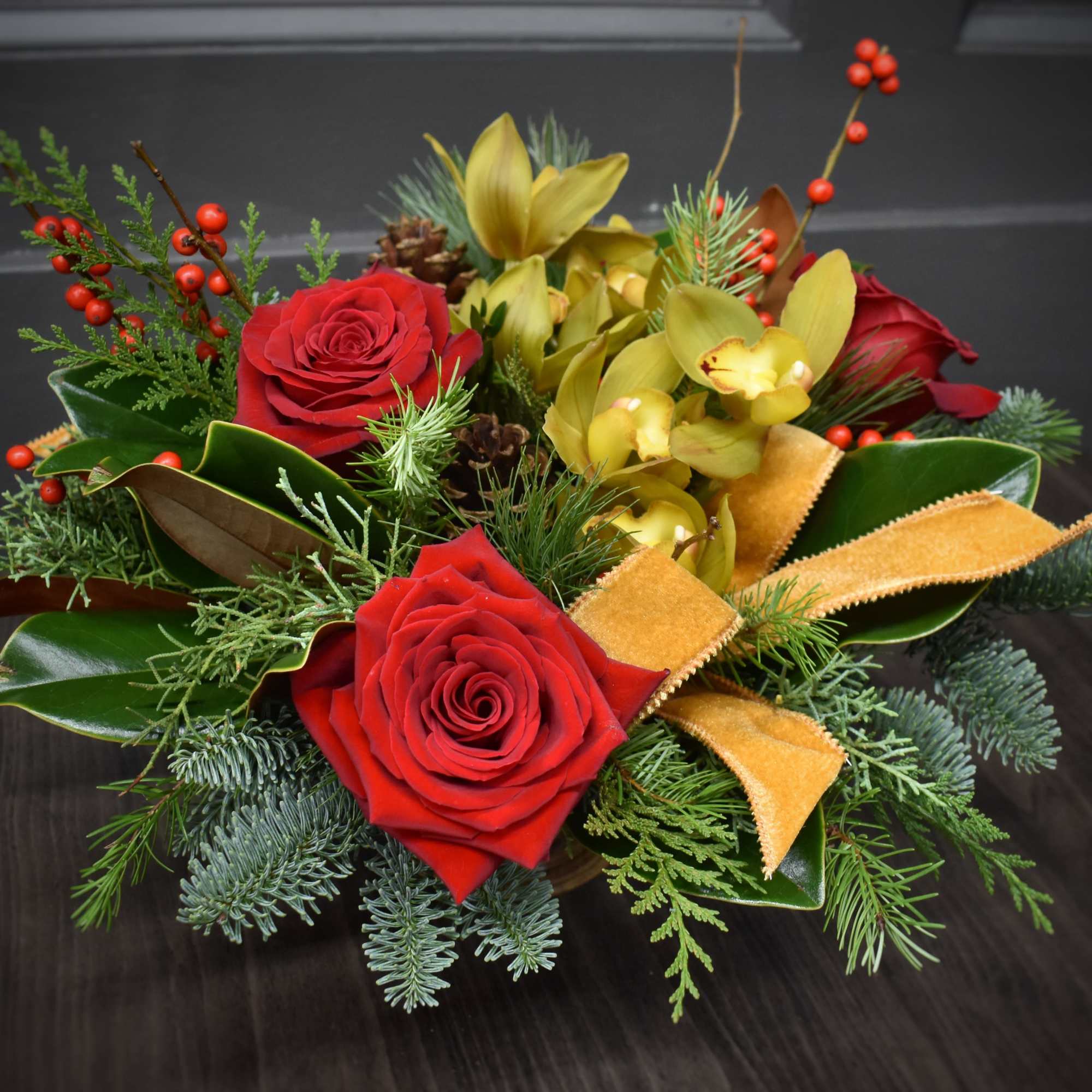 Nothing says classic Christmas like fresh evergreens, pinecones and berries! This charming