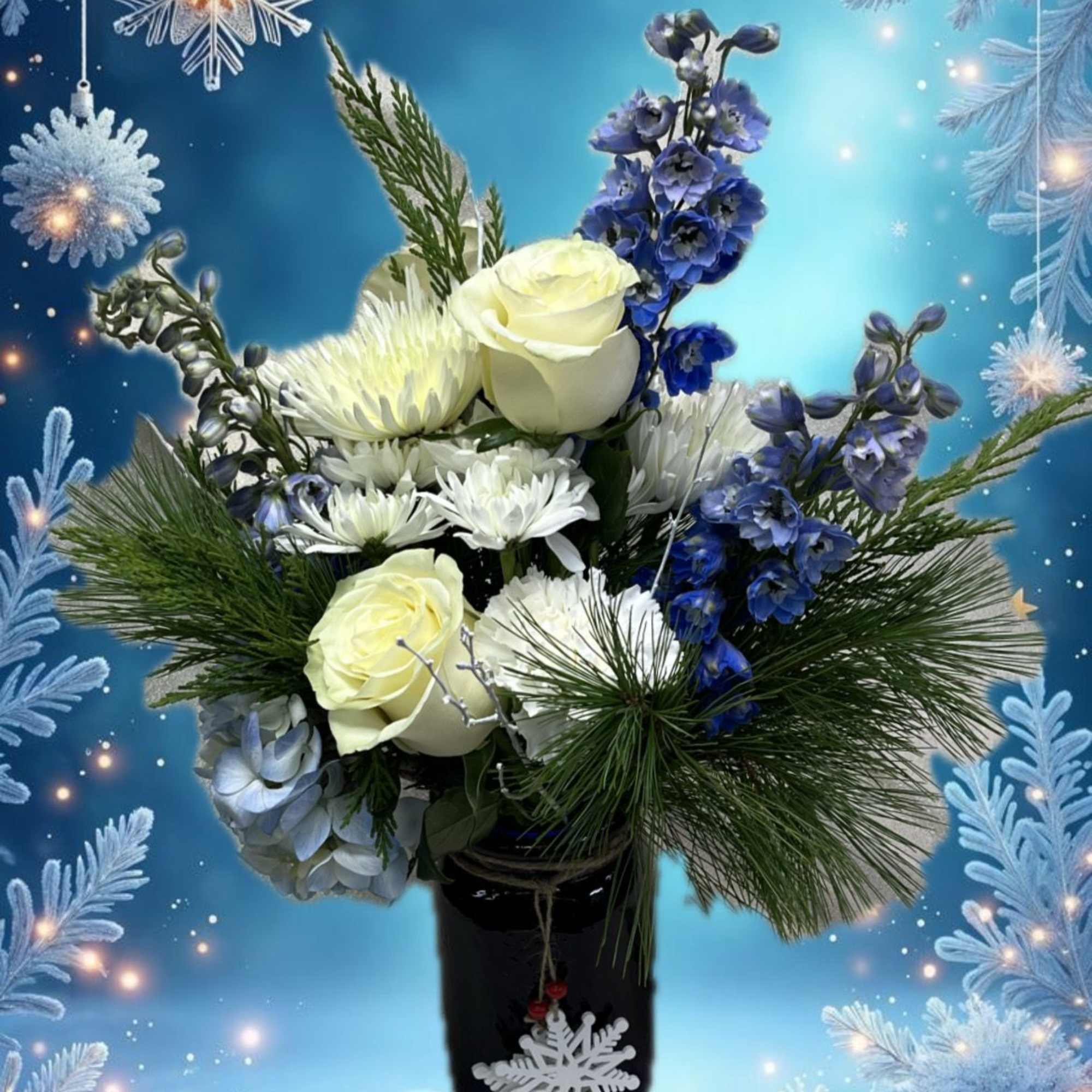 Send this wintry mixed bouquet to someone on a cold winters day.