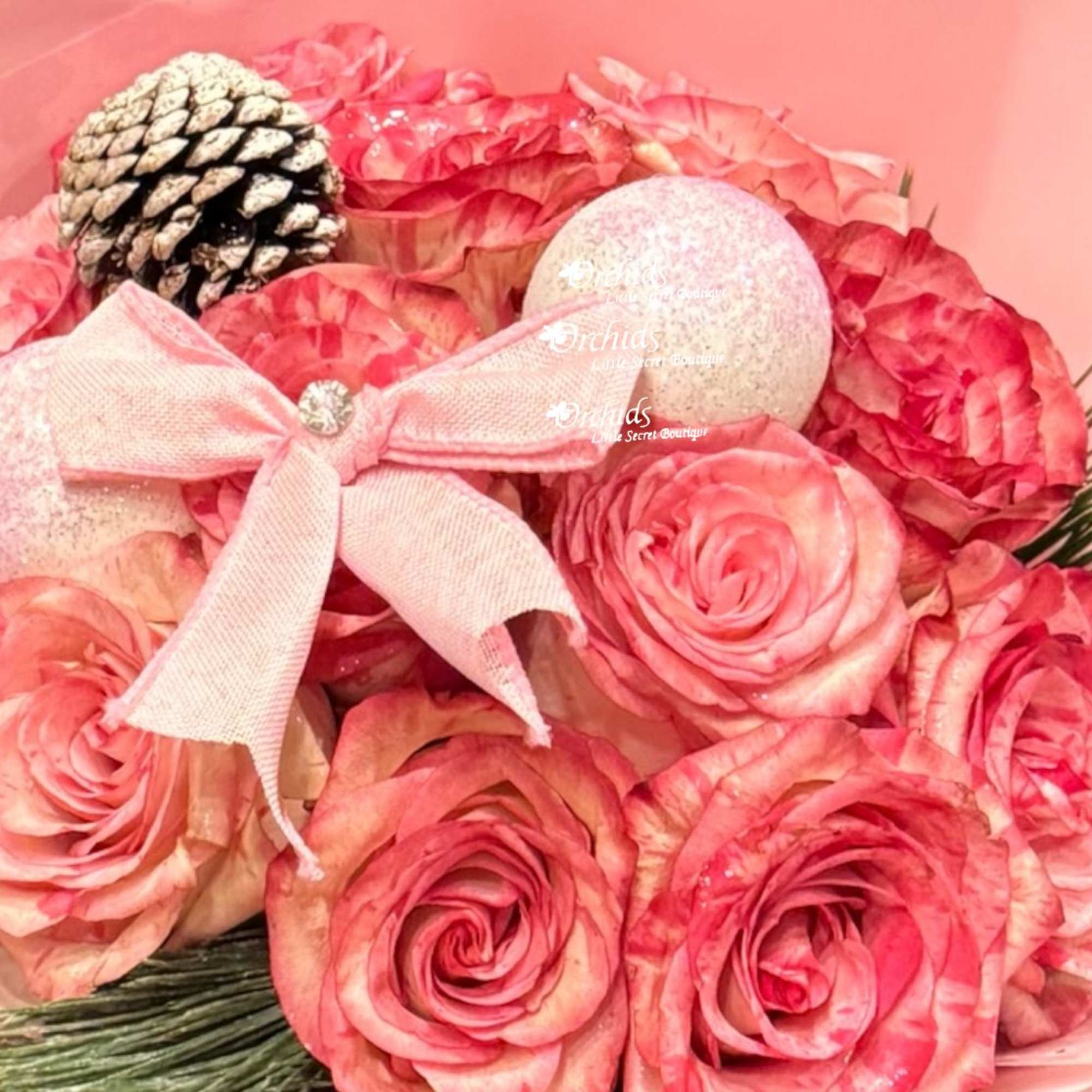 Embrace the power of pink in this lovely December seasonal hand wrapped