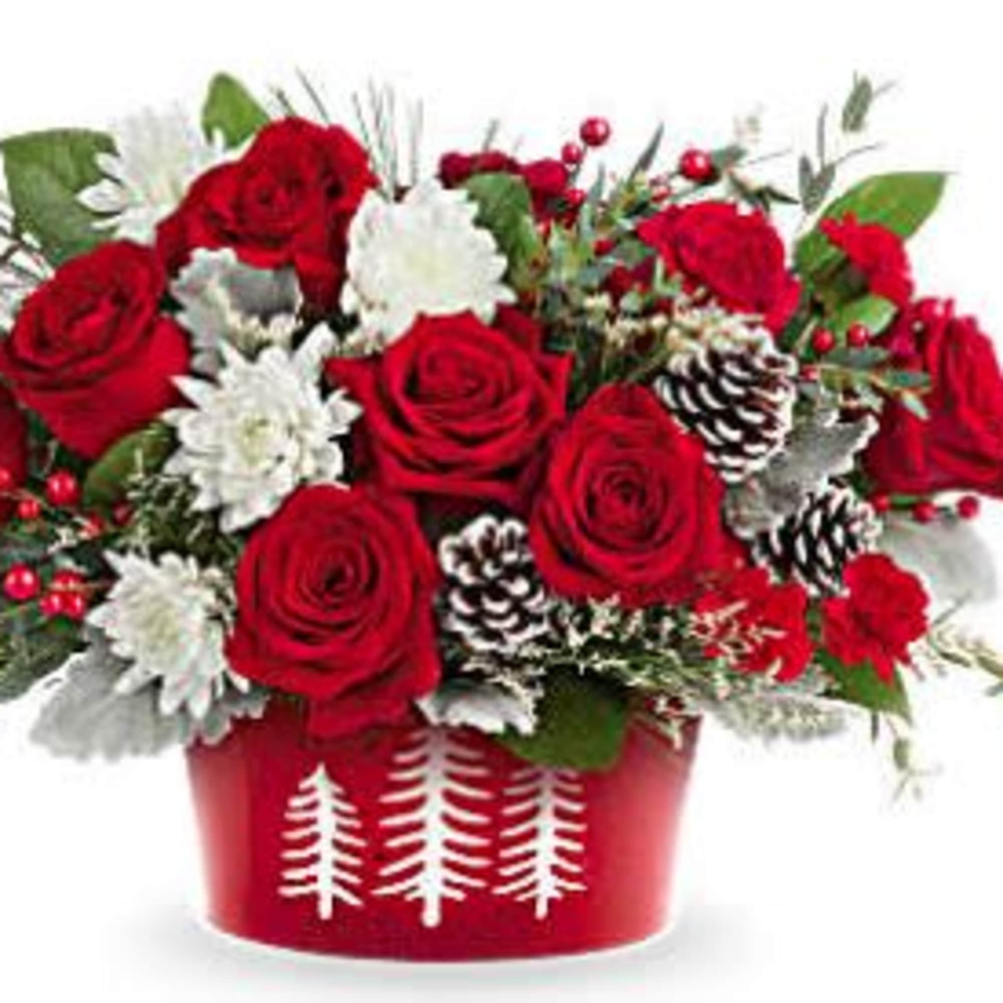 Celebrate the season with Teleflora's Snowy Pines Centerpiece. Bursting with red roses