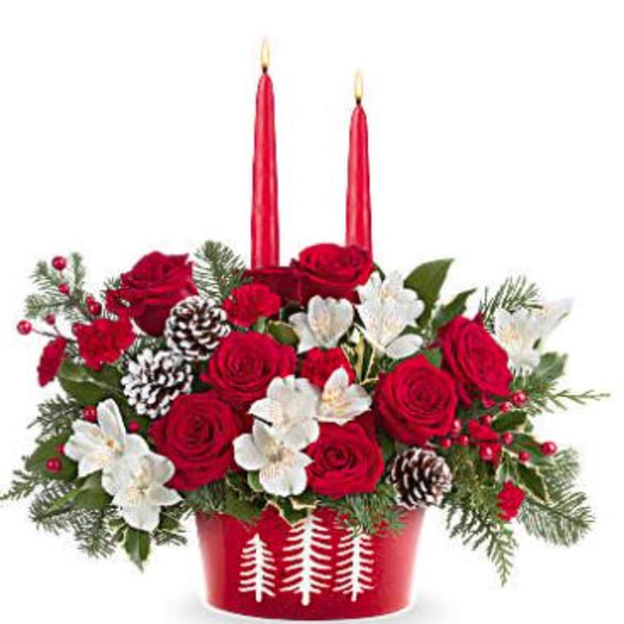 Glow up your holiday table with Teleflora's Evergreen Charm Centerpiece. Red roses