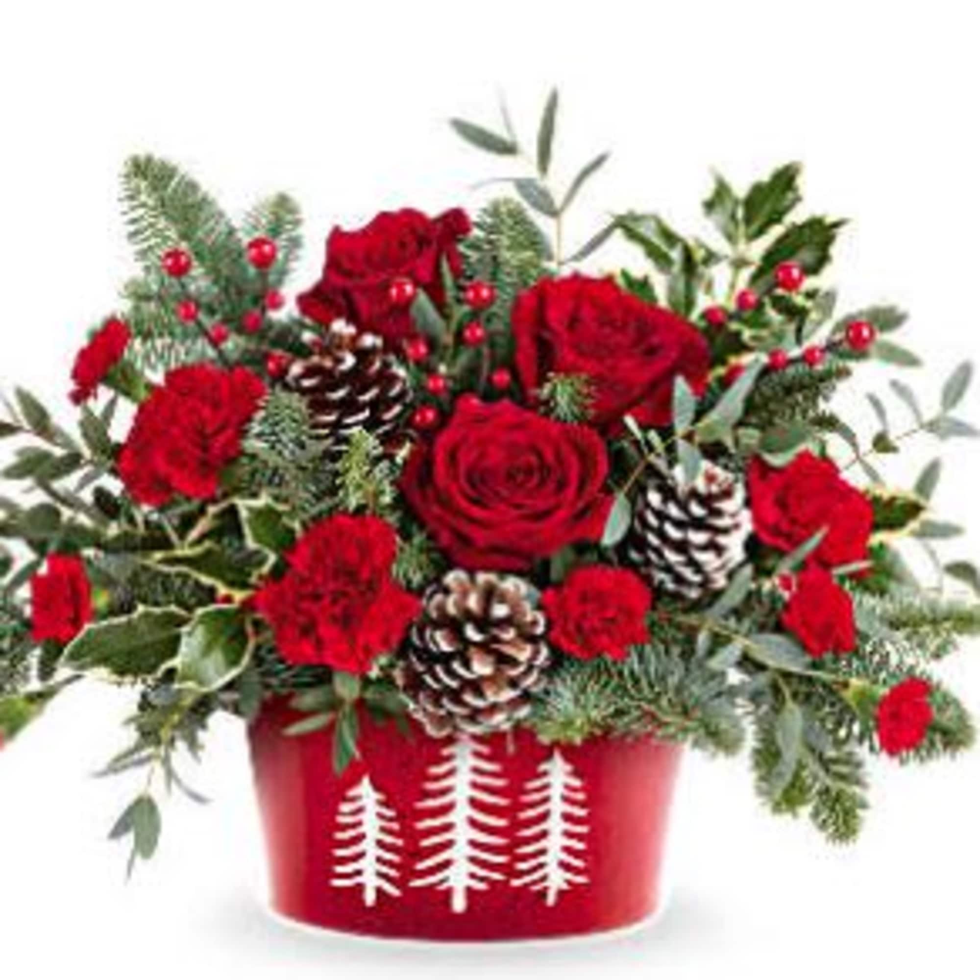 Teleflora's Winter Whimsy Centerpiece brings festive cheer to your table. Red roses