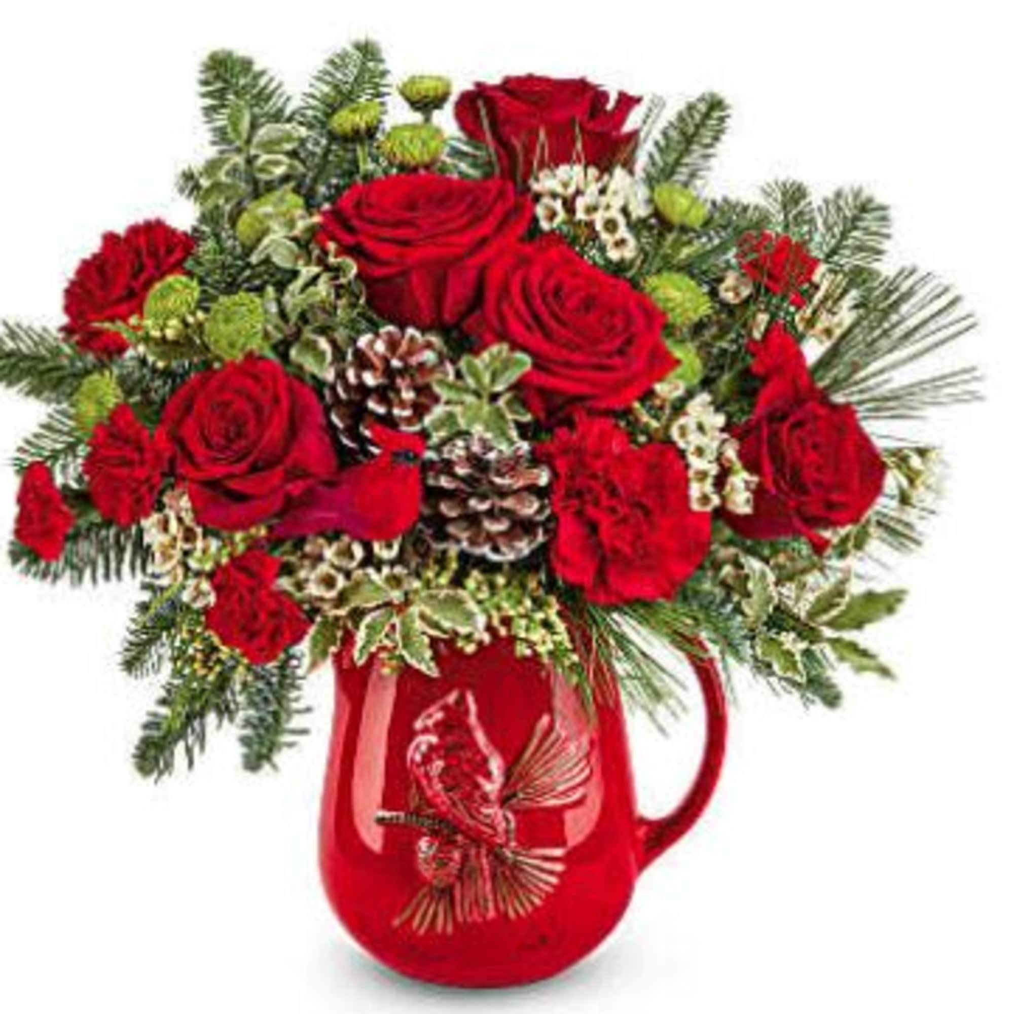 Teleflora's Festive Flight Bouquet spreads holiday cheer with red blooms, winter greens