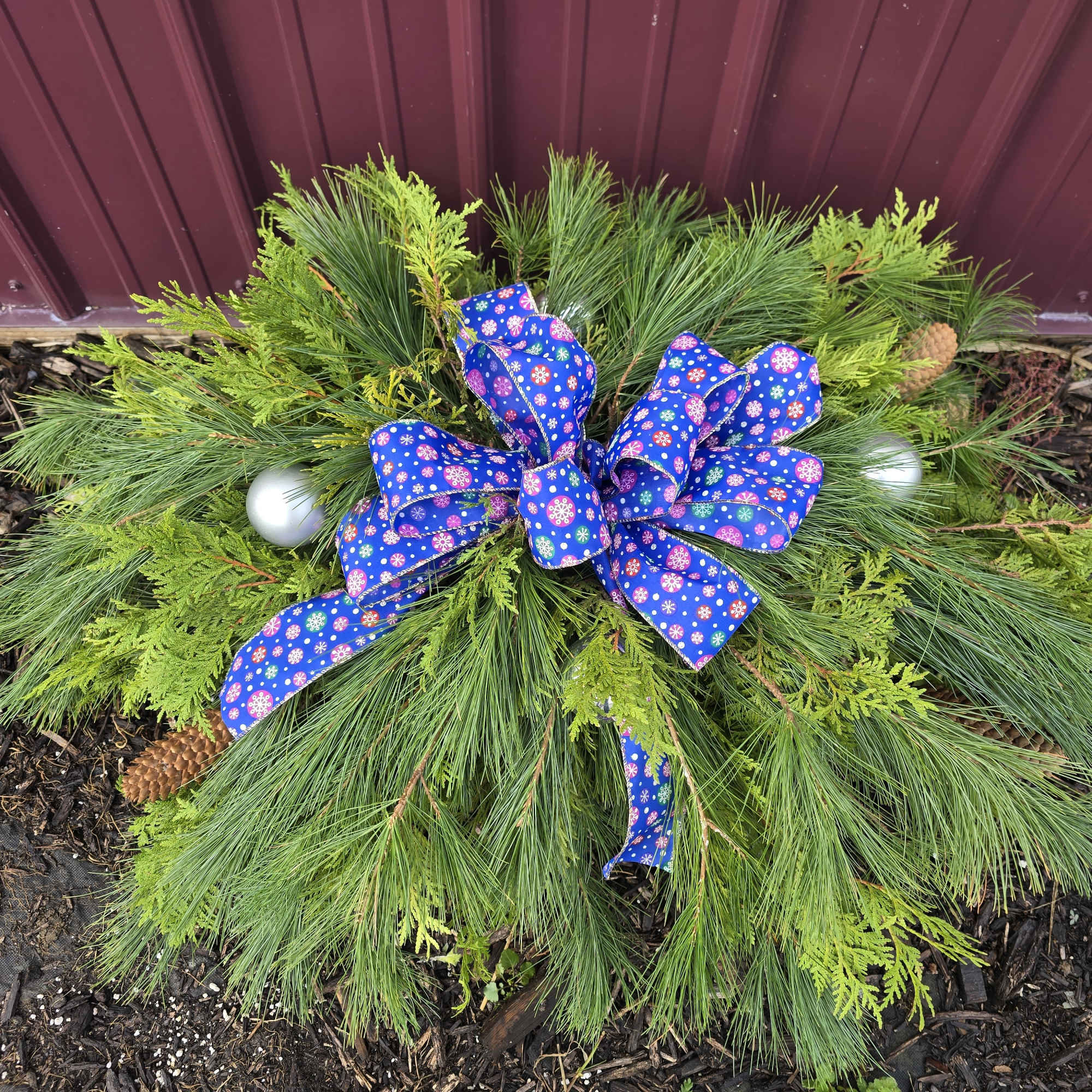 Half size fresh pine grave covering. Your choice of color of bow