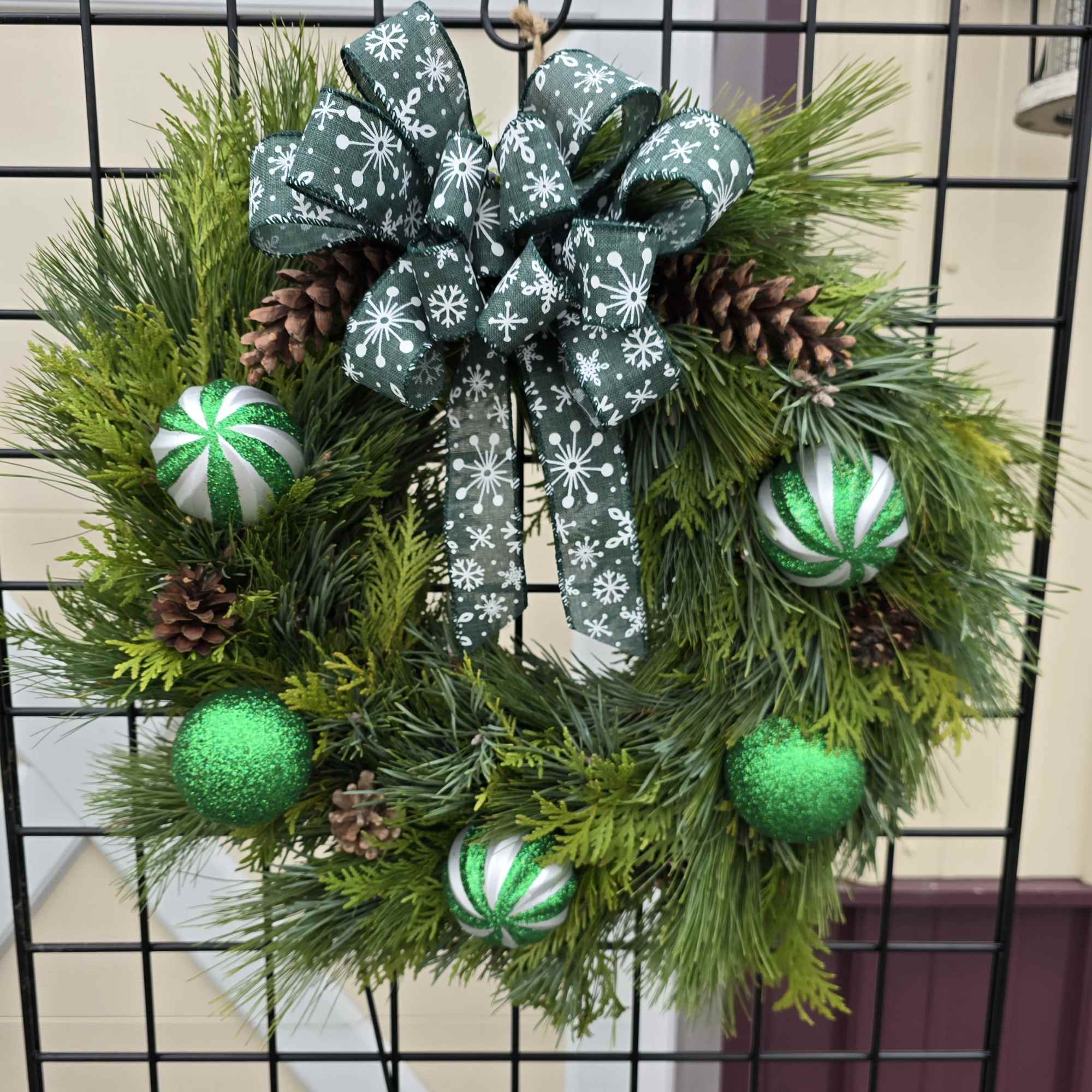 Handmade fresh pine wreaths made with 3 types of pine on a