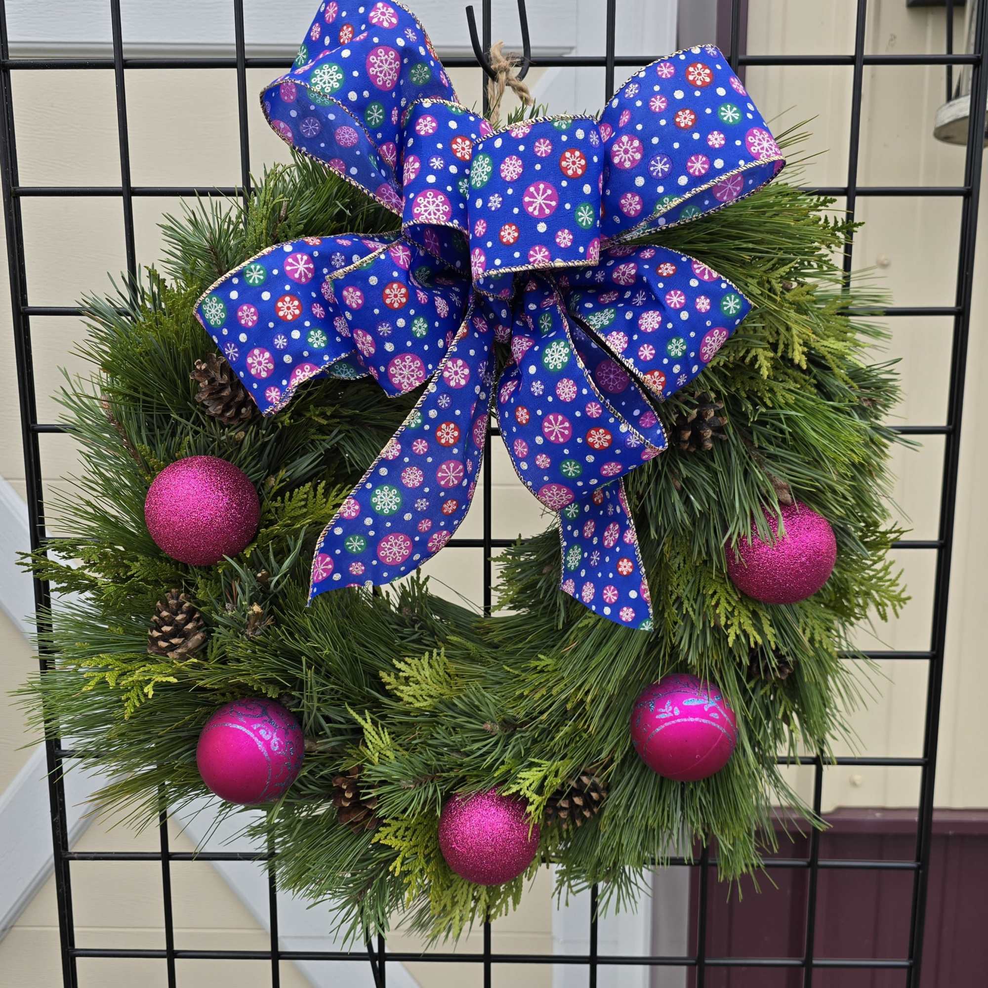 Handmade fresh pine wreaths made with 3 types of pine on a