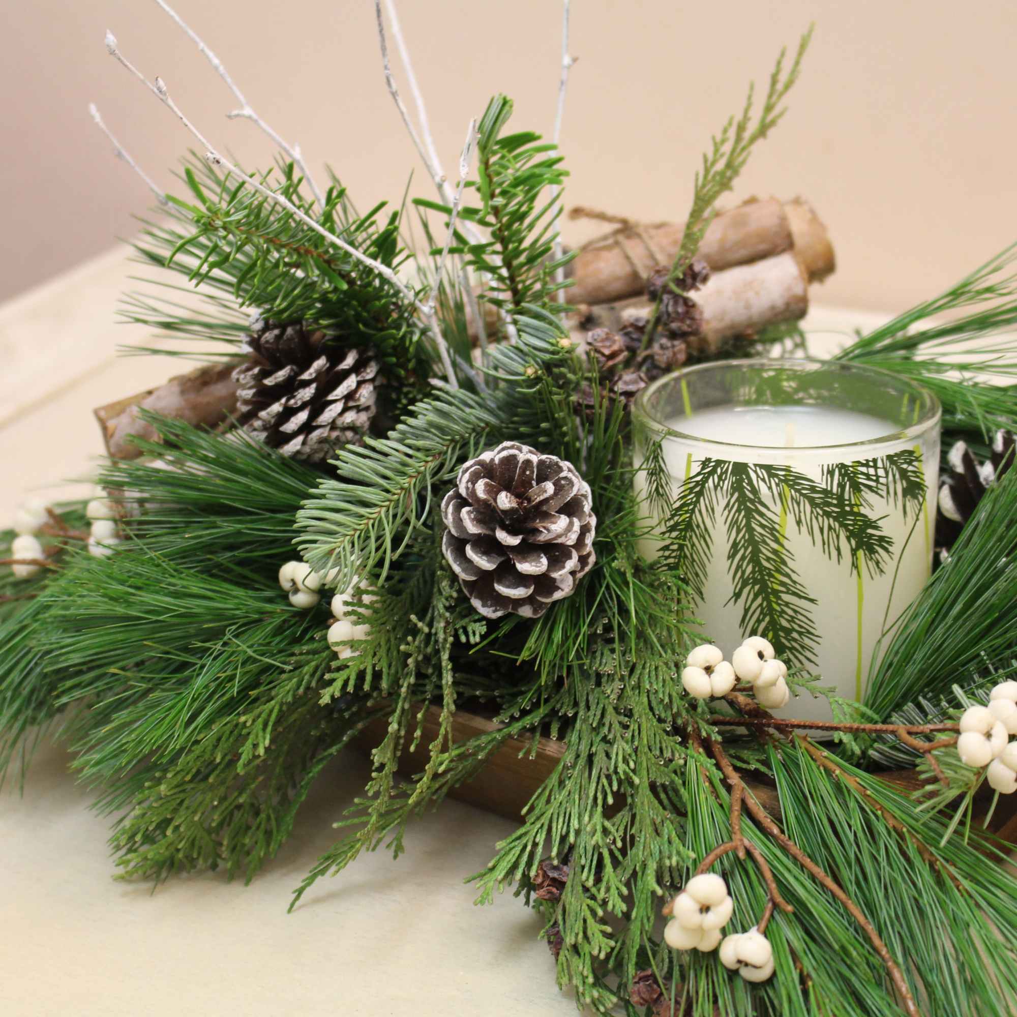 Great hostess gift or holiday centerpiece.  All the fresh evergreens of