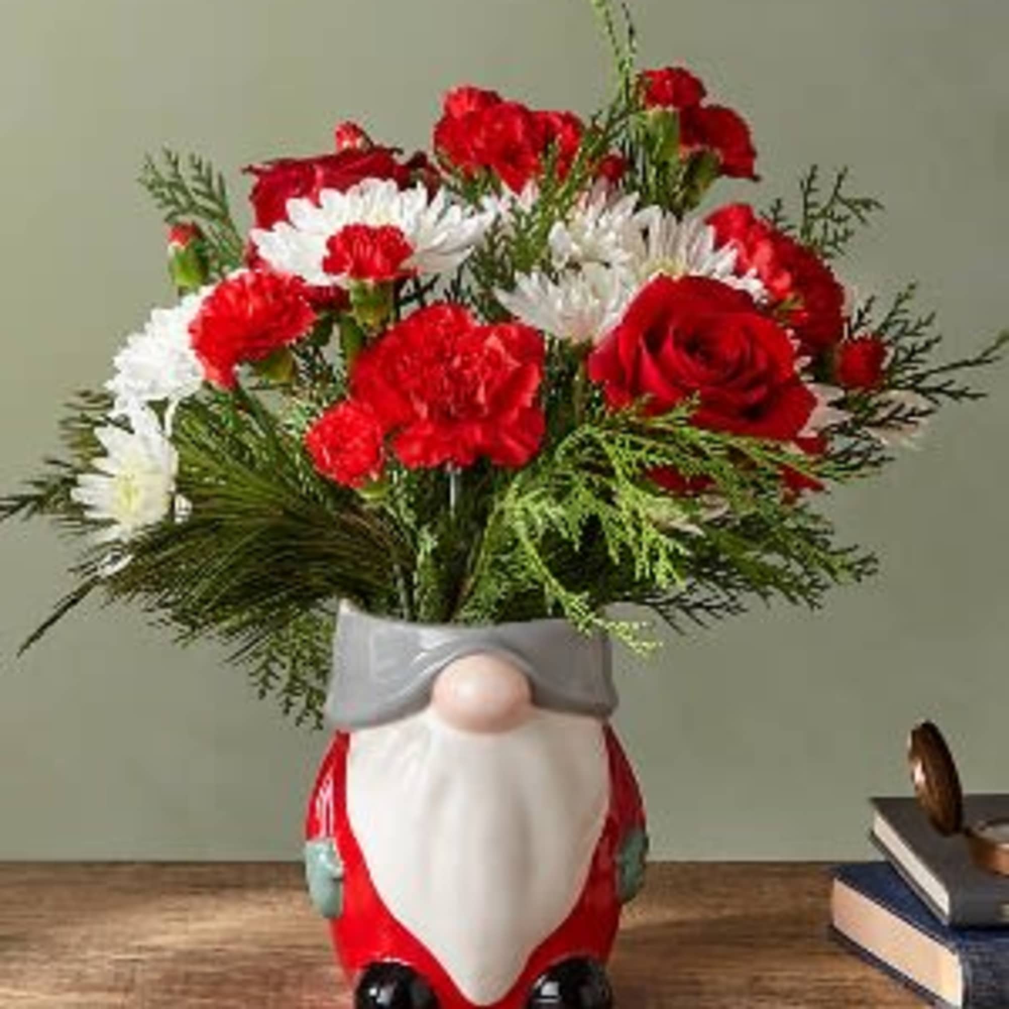This delightful keepsake gnome will be sure to dress up the holiday