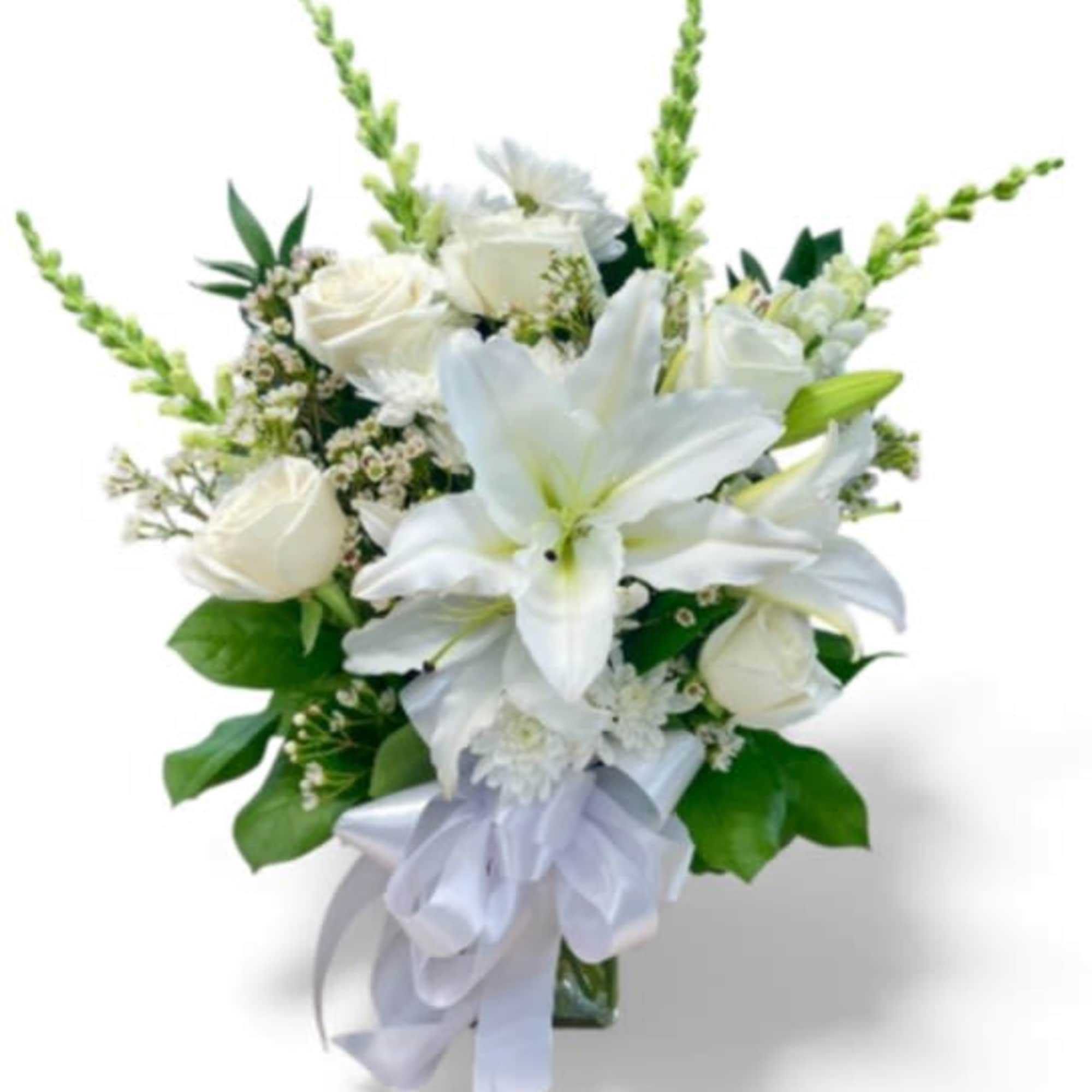 This elegant sympathy arrangement is beautifully showcased in a 7&quot; rectangular vase