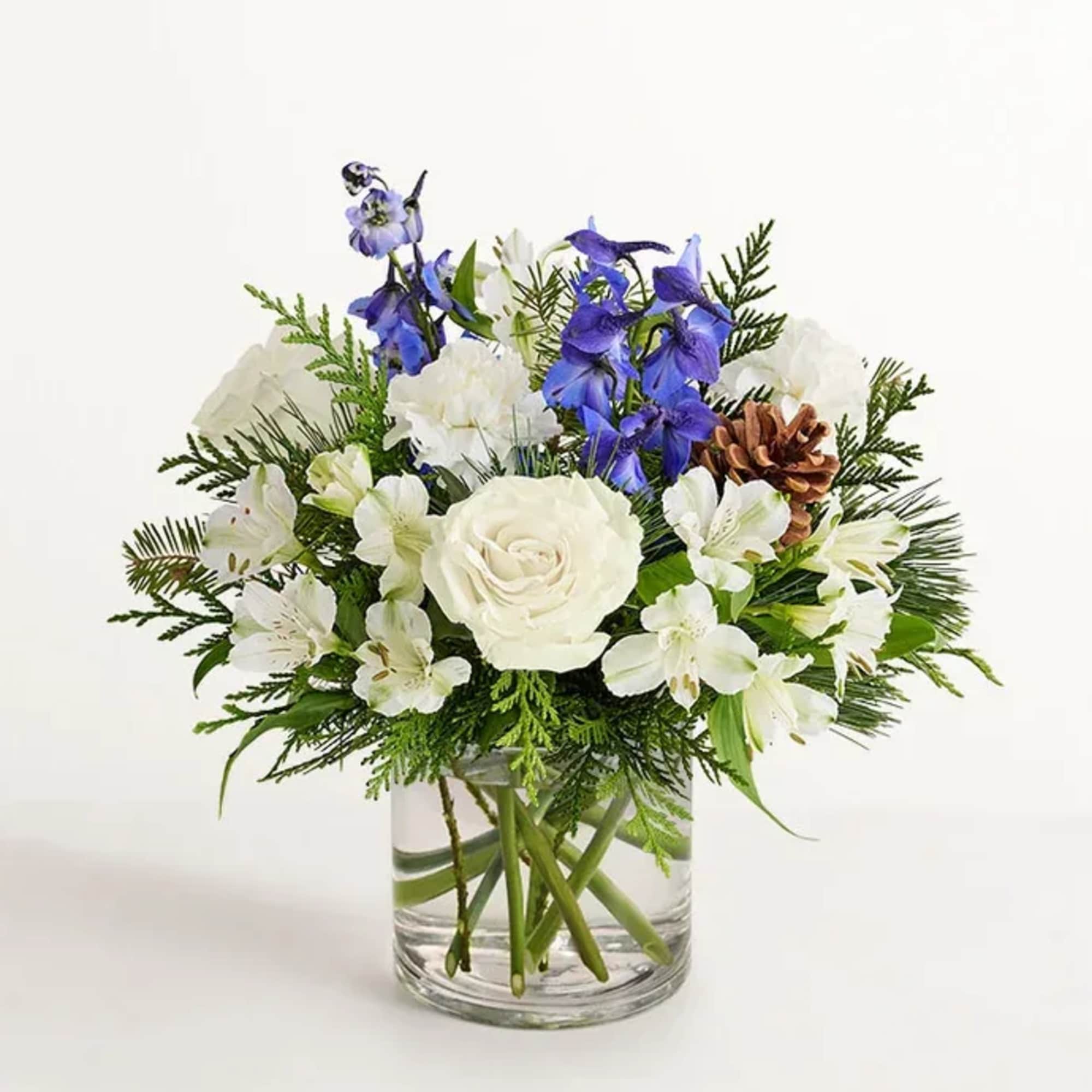 BLUE DELPH, WHITE ROSES, PINE CONES BABIES BREATH