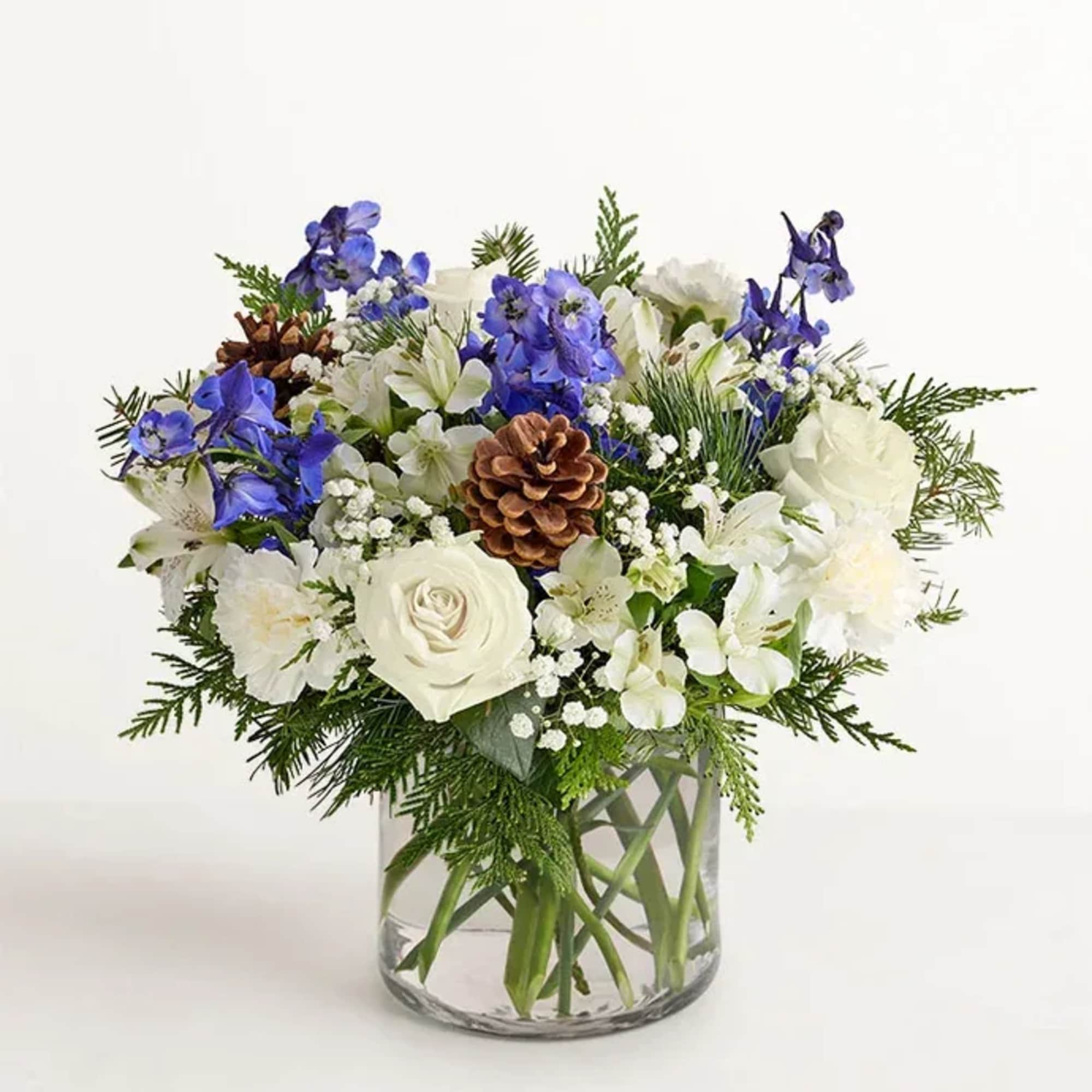 BLUE DELPH, WHITE ROSES, PINE CONES BABIES BREATH