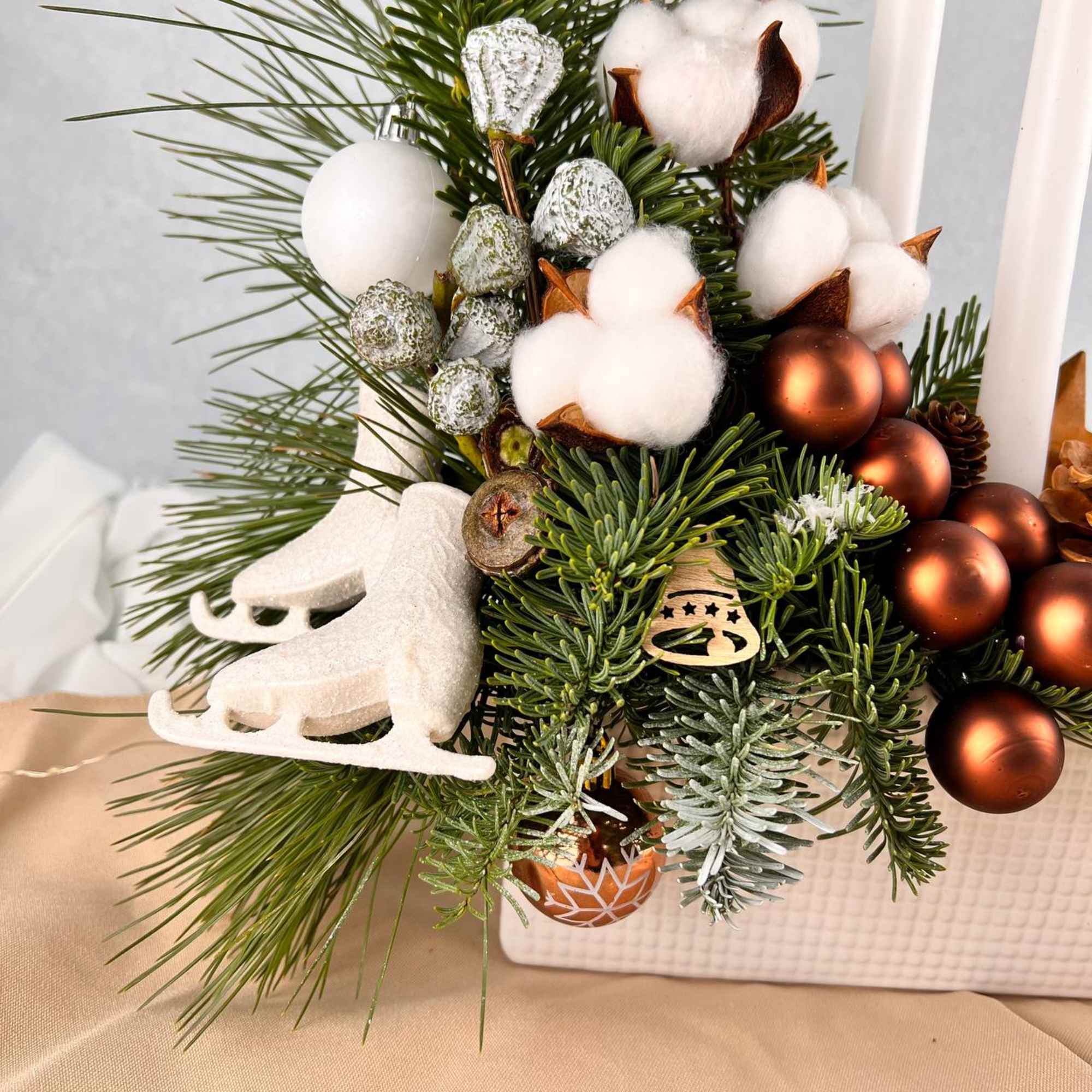 Christmas arrangement with candles is the perfect Christmas gift.
