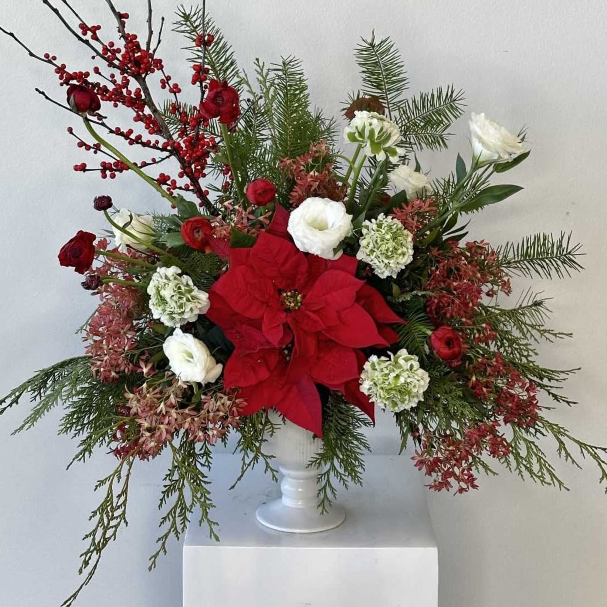 Celebrate the magic of the holidays with No&euml;l, a luxurious Christmas-themed floral