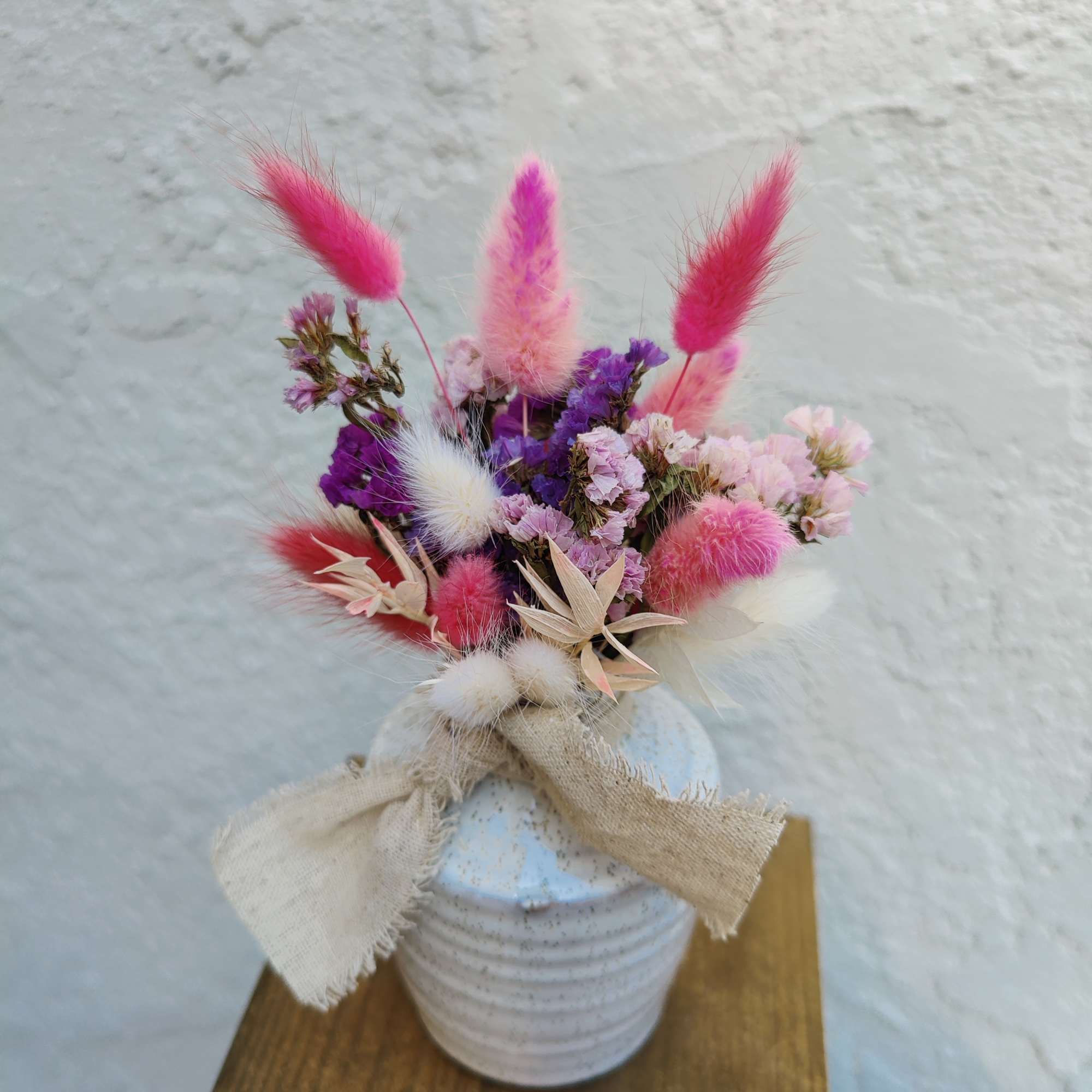 Beautiful Dry floral arrangement decorated with dry wild flowers .
Real dried and