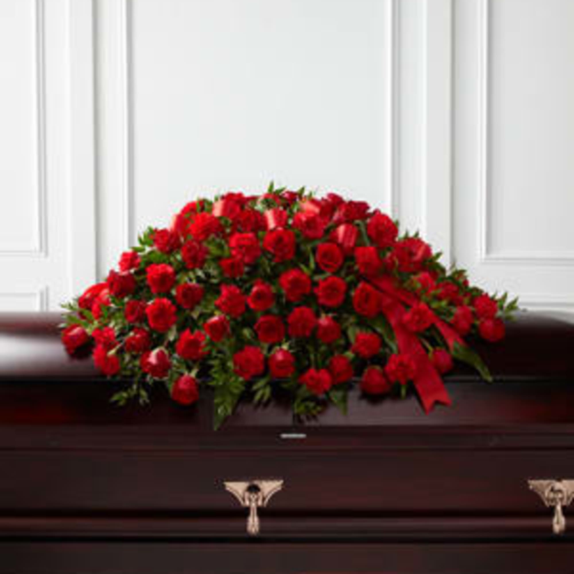  The FTD&reg; Dearly Departed&trade; Casket Spray bursts with the love and