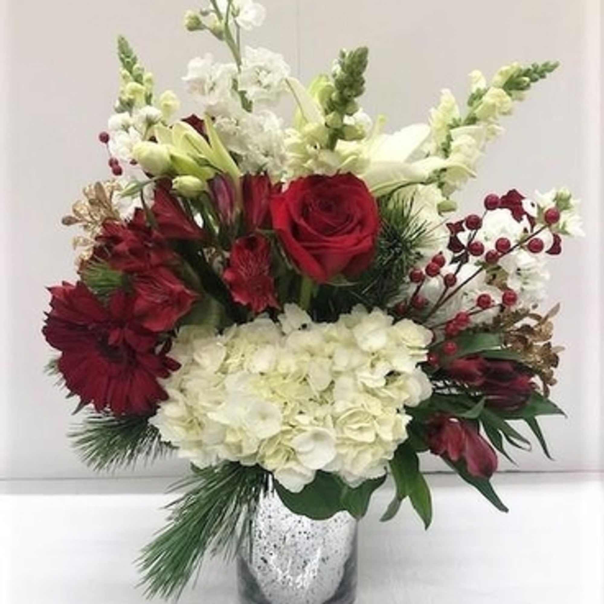 Berry Jubilee

A festive celebration of color and texture! The Berry Jubilee arrangement