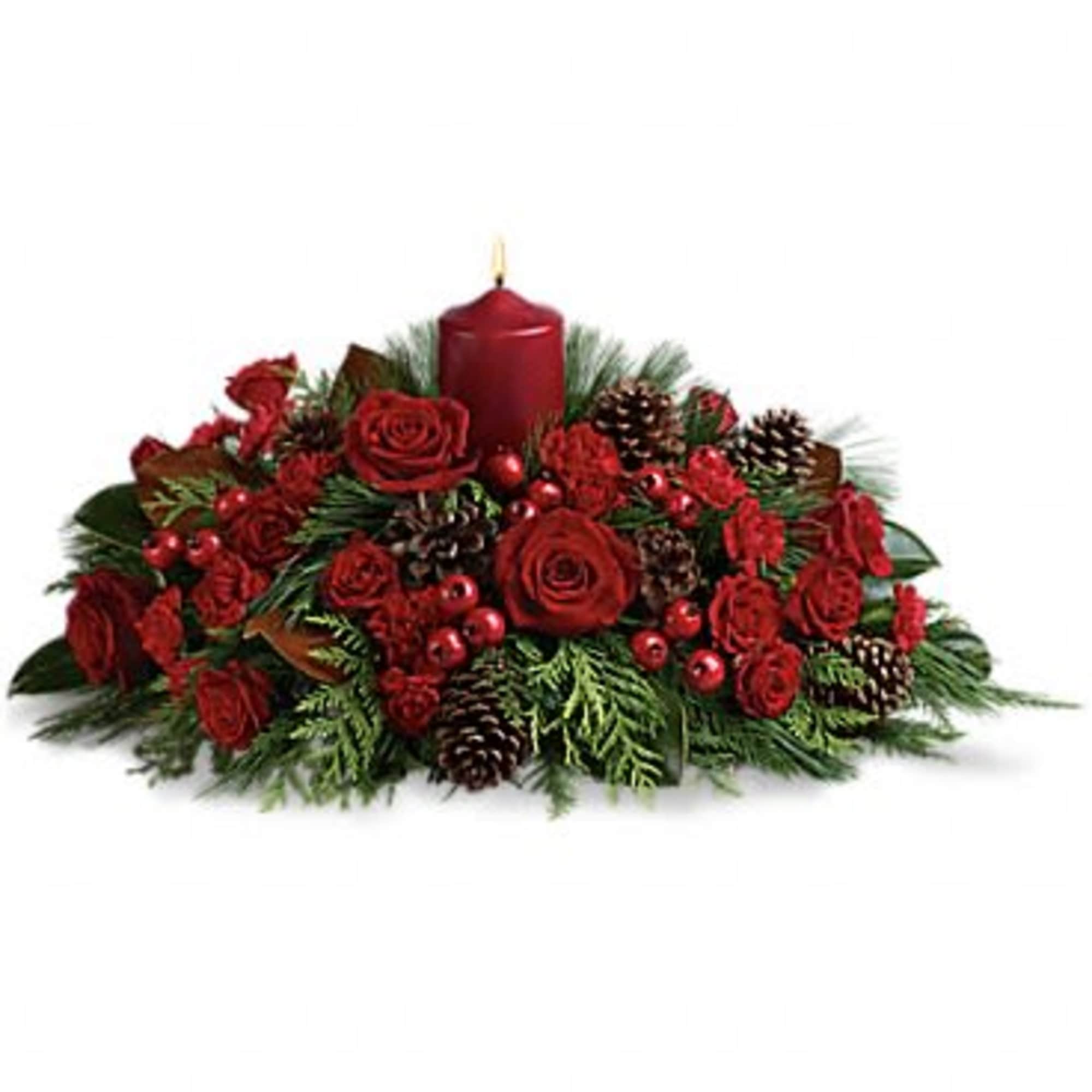 Round centerpiece which include Christmas greens, red roses, berries and pinecones. Deluxe