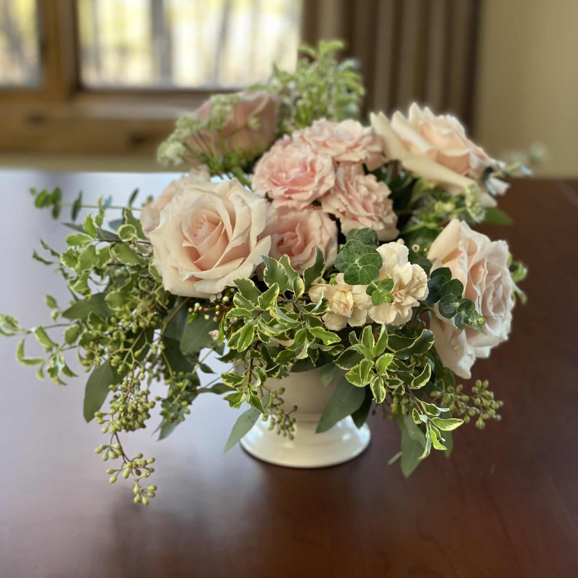 An absolutely gorgeous bouquet! Soft blushing pink hues to warm the heart.