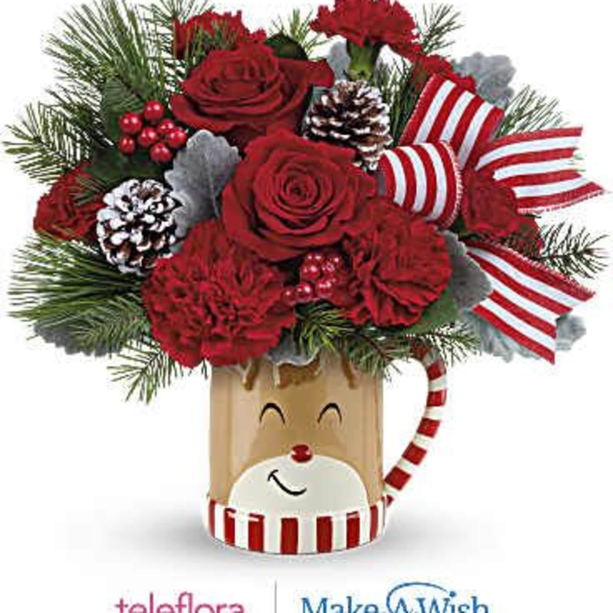 Overflowing with festive blooms, this adorable reindeer delivers your holiday wishes! The