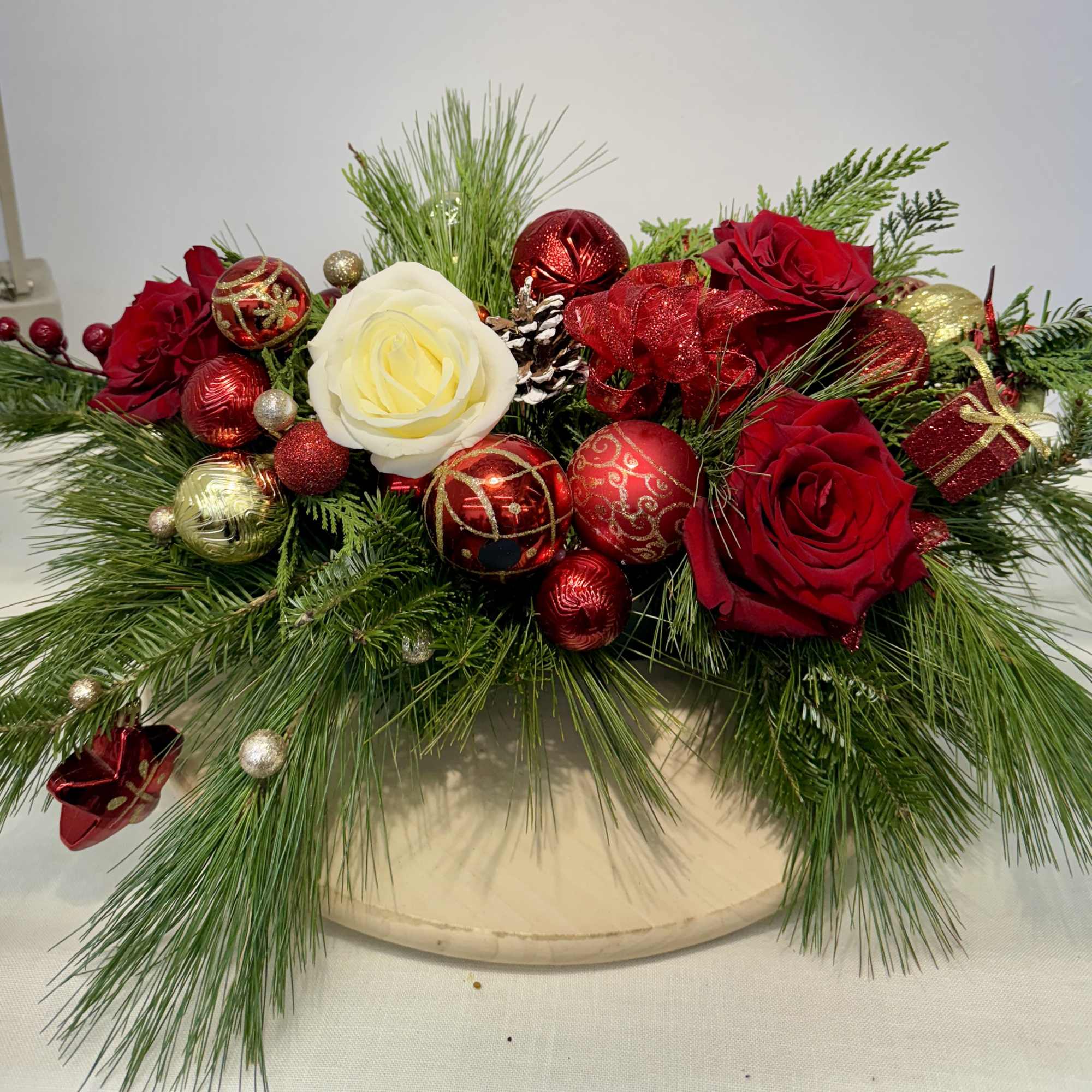 Bring the spirit of the holiday season indoors with this beautiful arrangement.