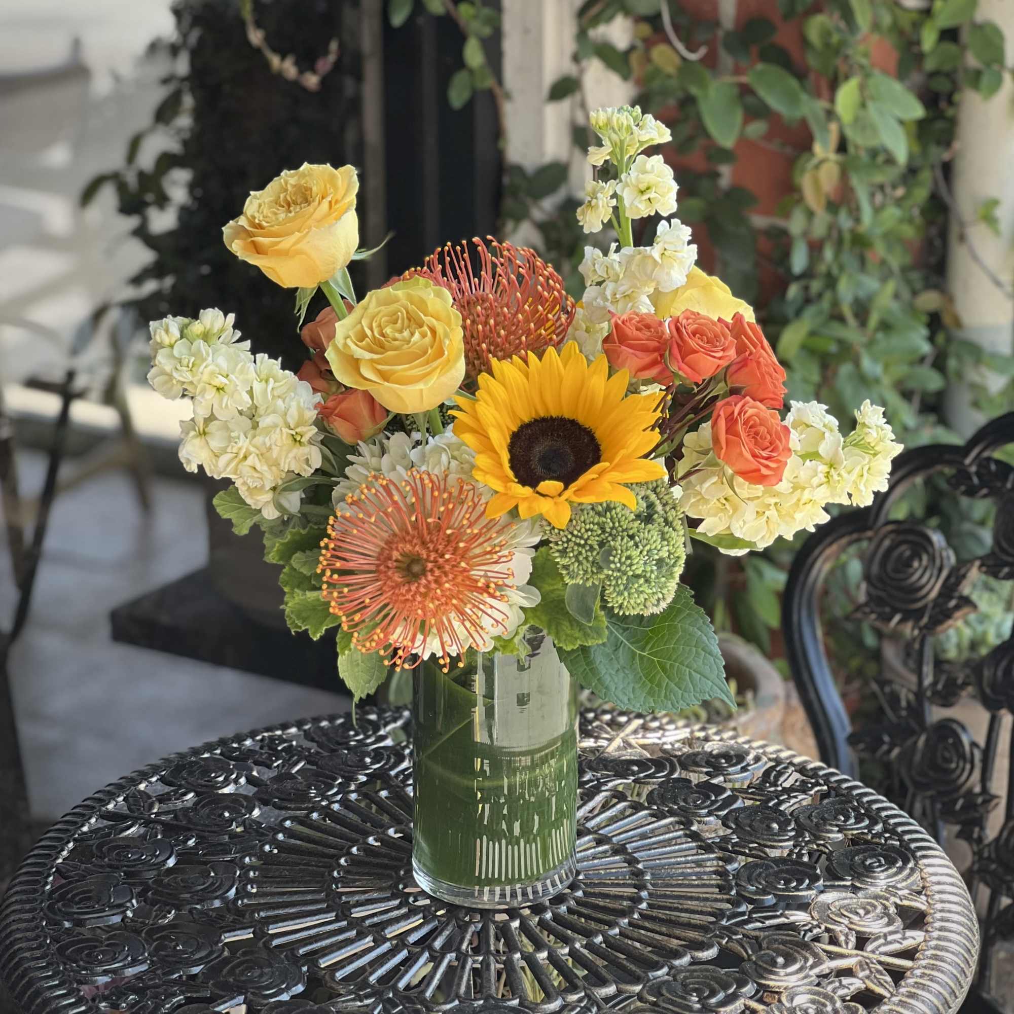 Brighten any space with this radiant mix of sunny yellow roses, bold