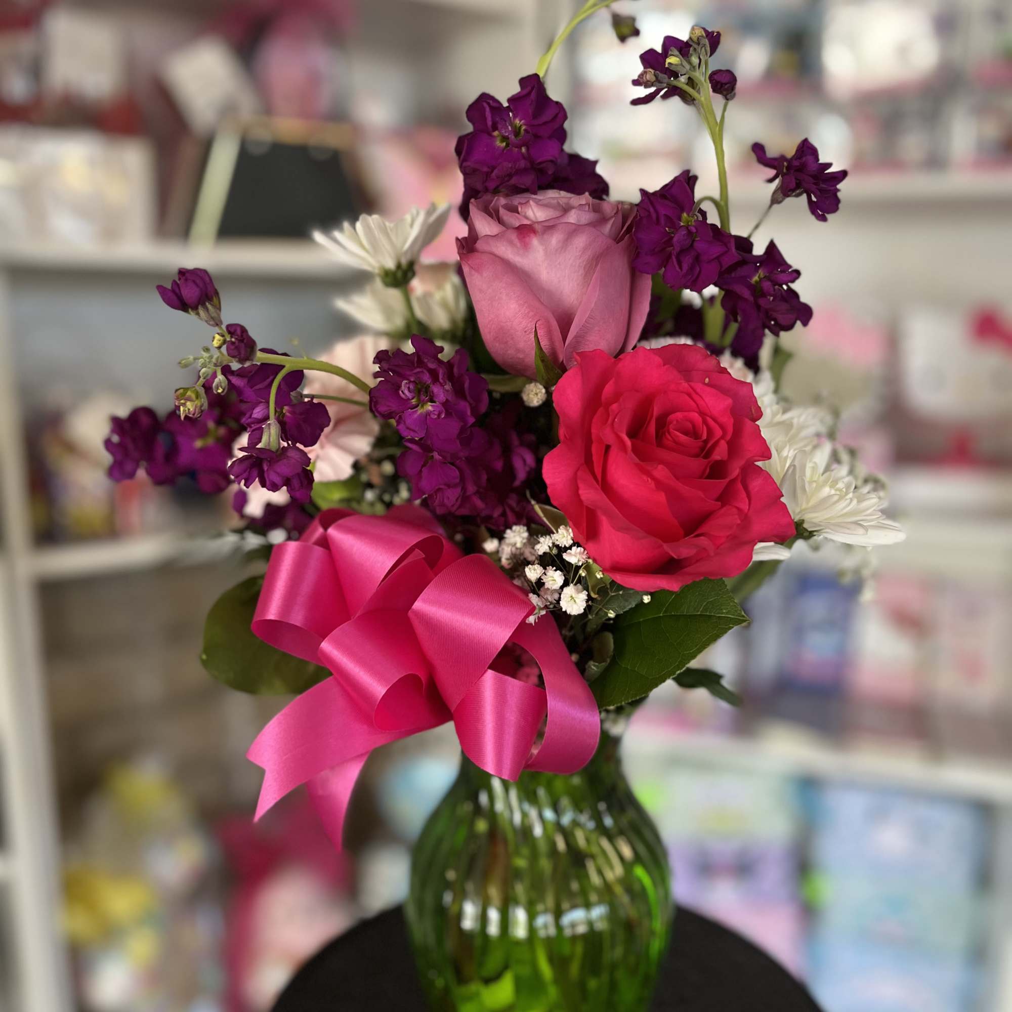 fresh flowers in vase setting 