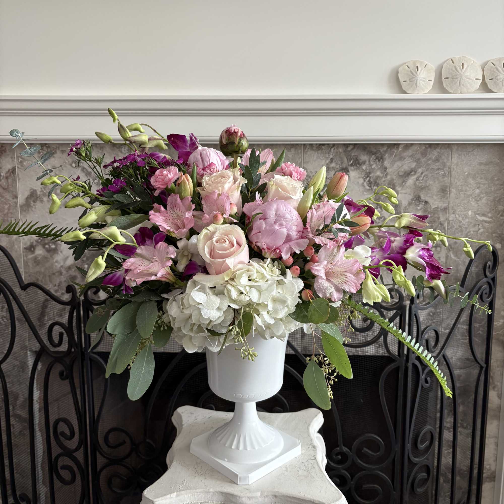 Eyes and hearts alike are drawn to this alluring and attractive arrangement