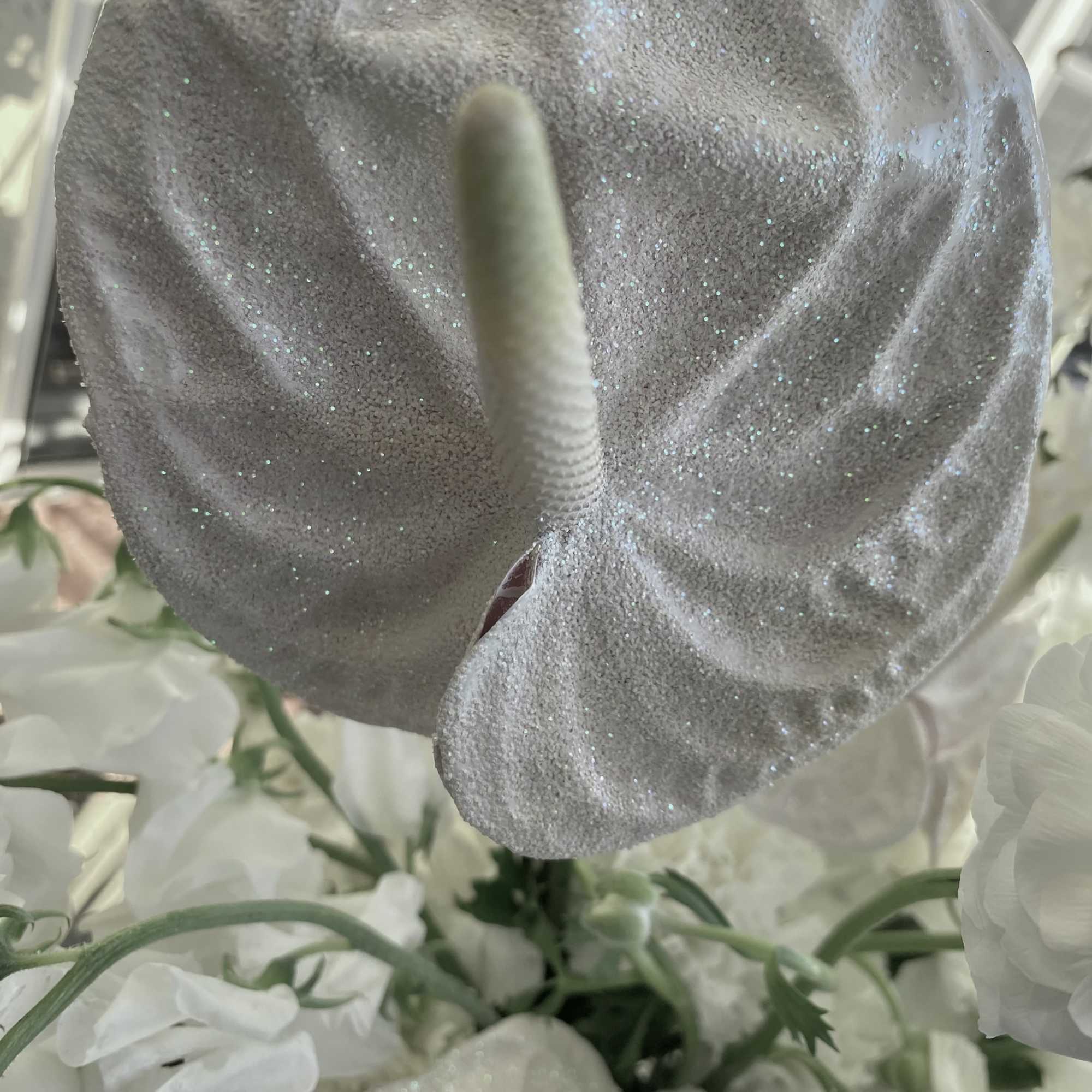 Soft, sculptural, and quietly luxurious, Snowfall is a modern winter-white floral arrangement