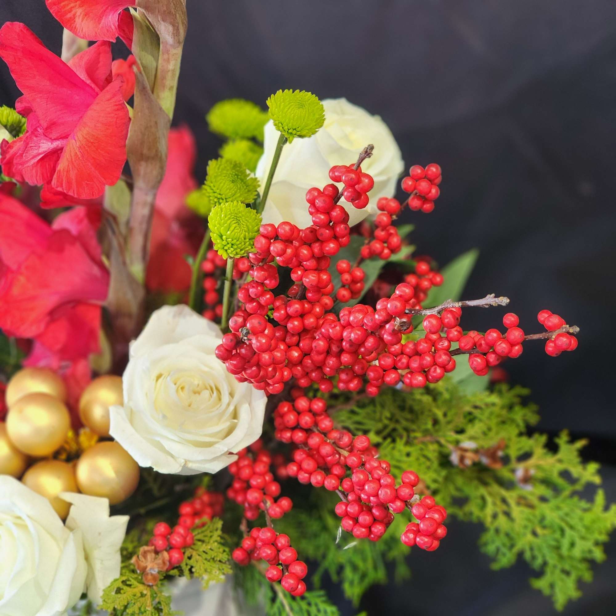 Bring in Christmas cheer with an elegant arrangement of red, white and