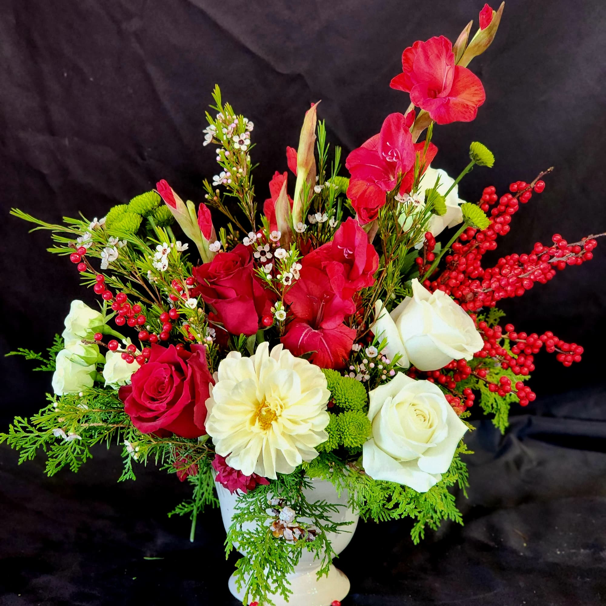 Bring in Christmas cheer with an elegant arrangement of red, white and