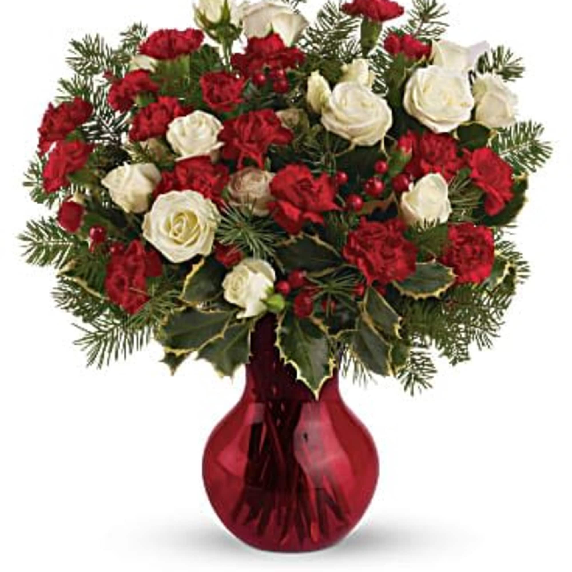 Featuring a wondrous assortment of white spray roses and red miniature carnations