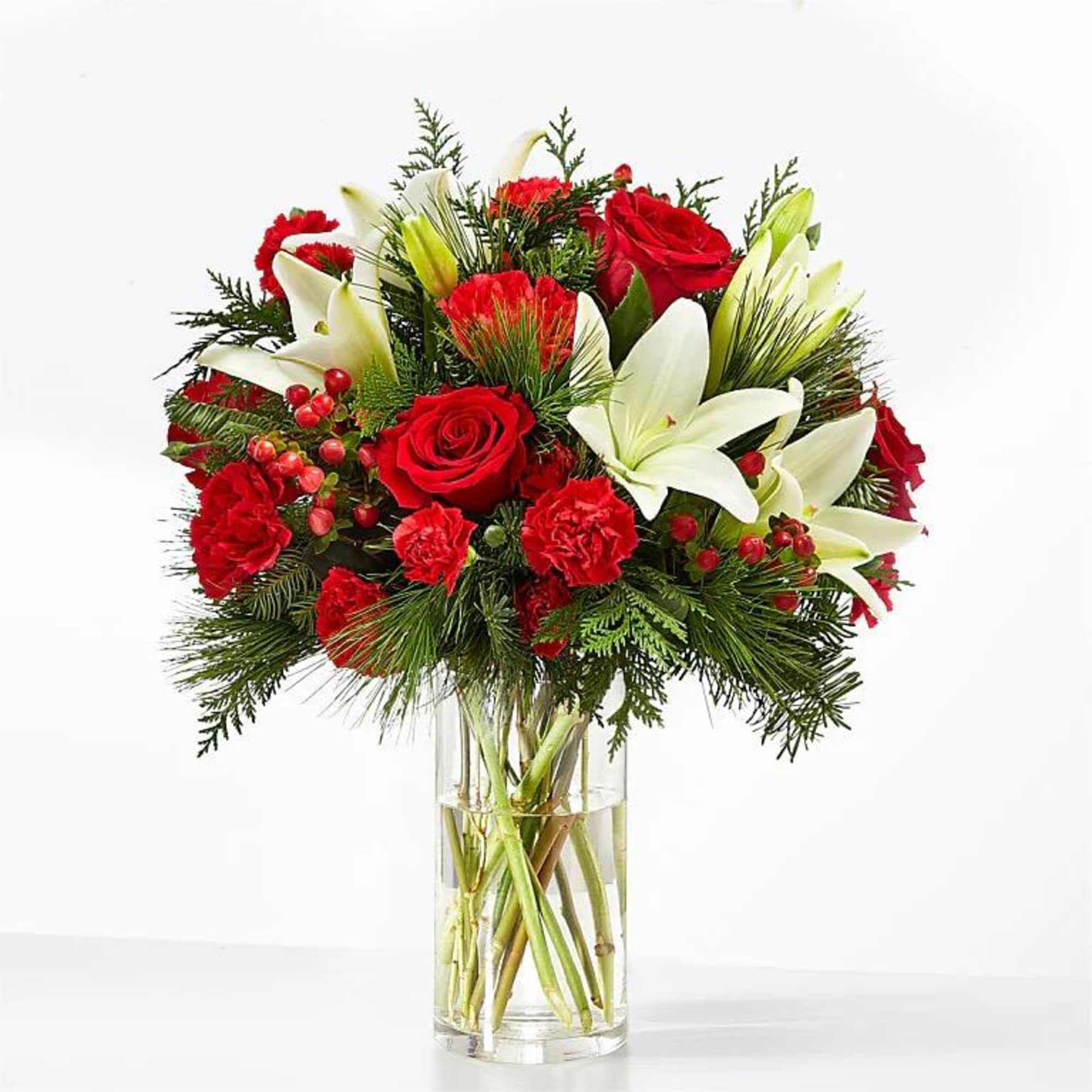 arrangement of white red and green flowers in stylish vase