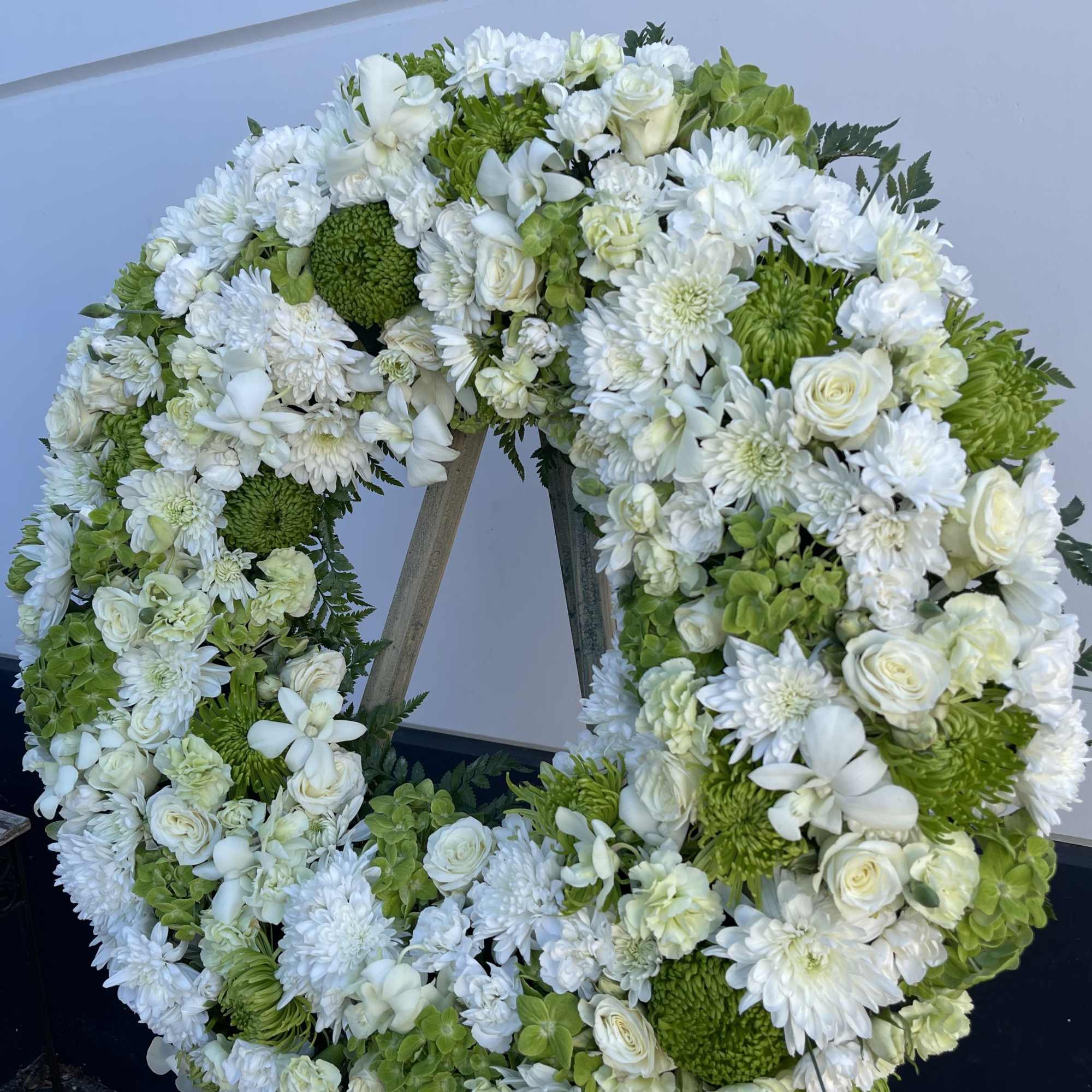 Green and white medium wreath approx 25in 
