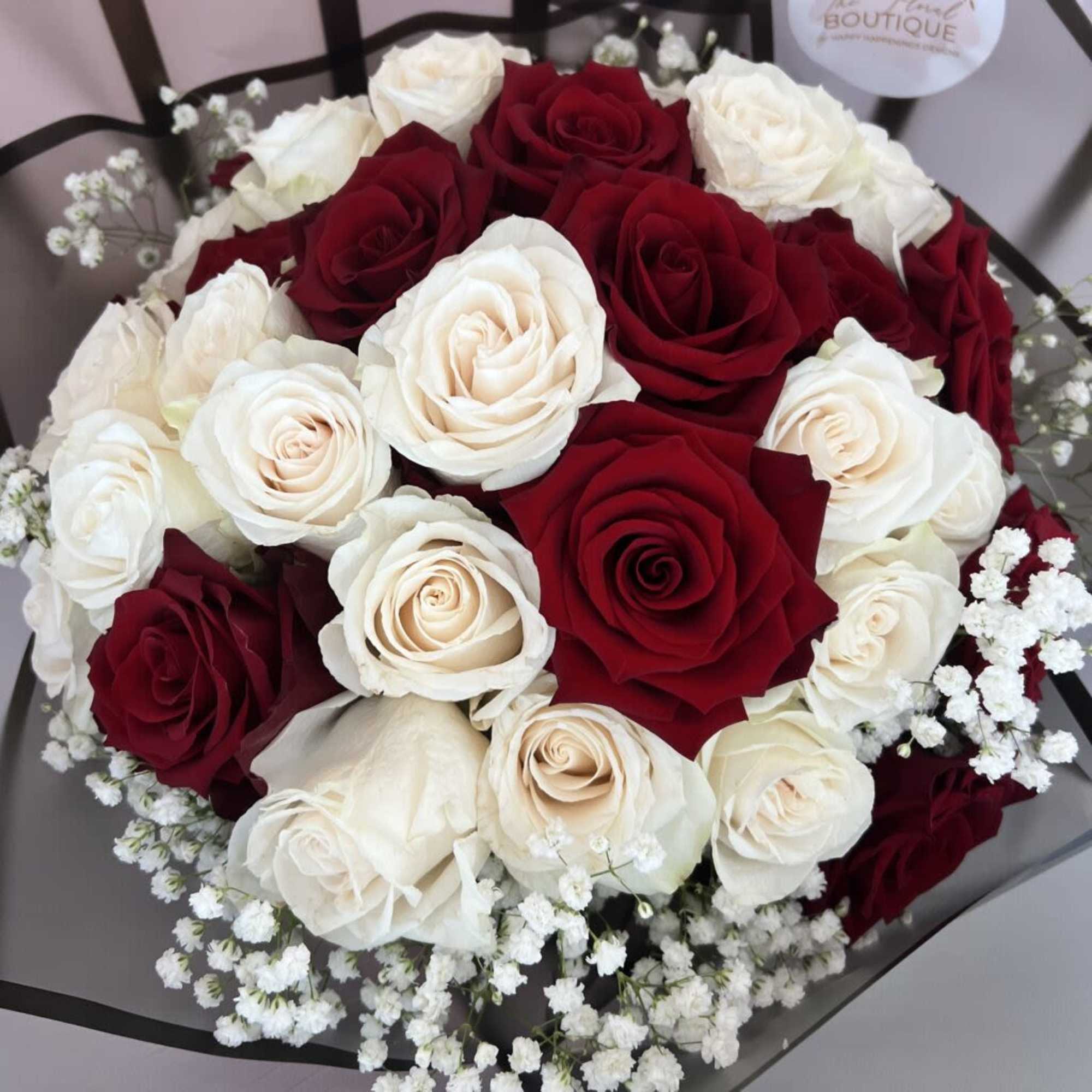 36 Premium Roses with crown wrapped Bouquet