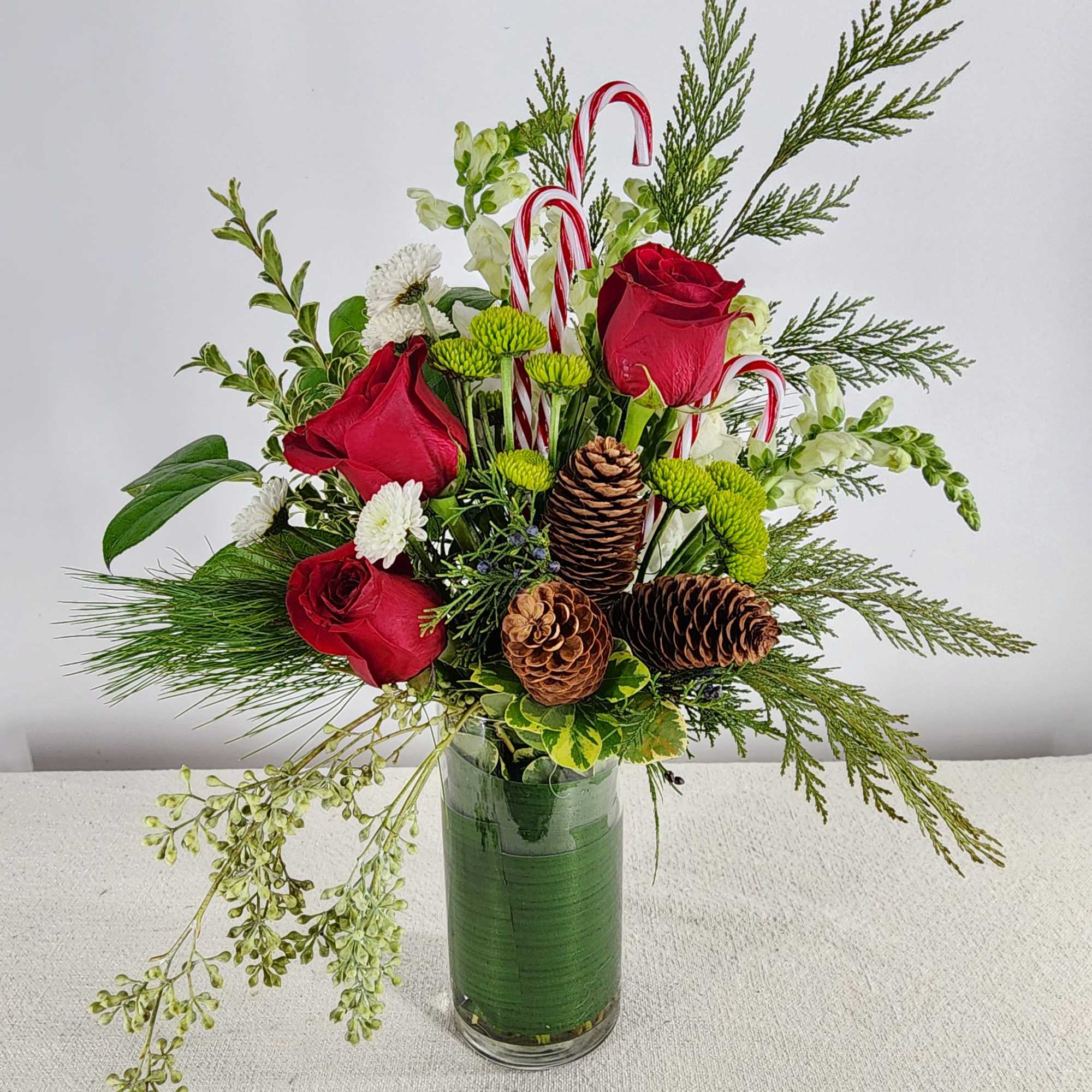 Celebrate the festive season with a delightful arrangement that captures the joy