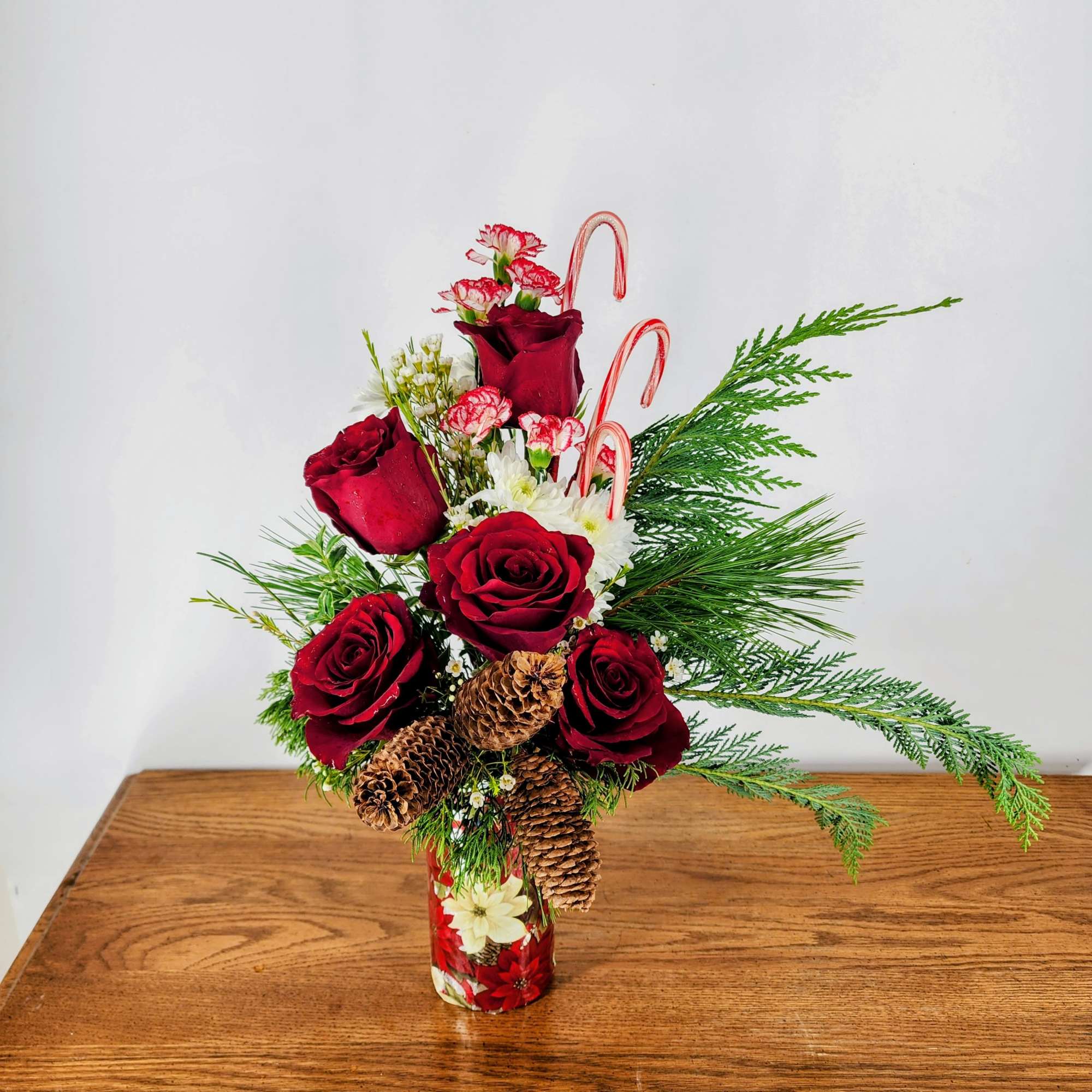 Celebrate the festive season with a delightful arrangement that captures the joy