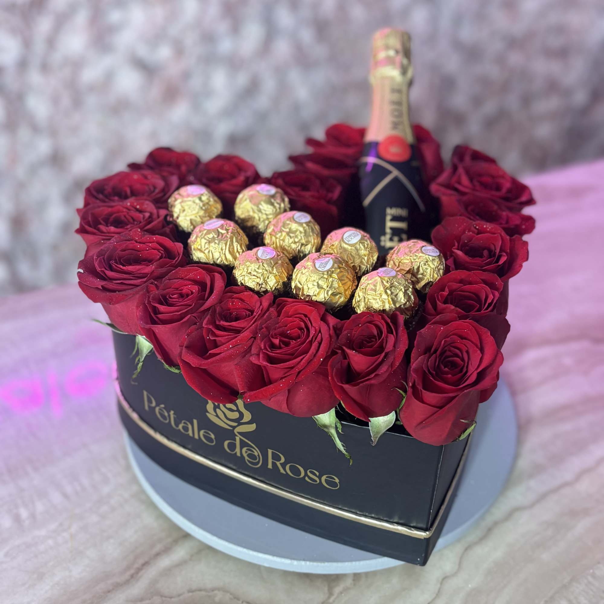 Mini Mo&euml;t combined with red roses and chocolates ferreros , perfect to