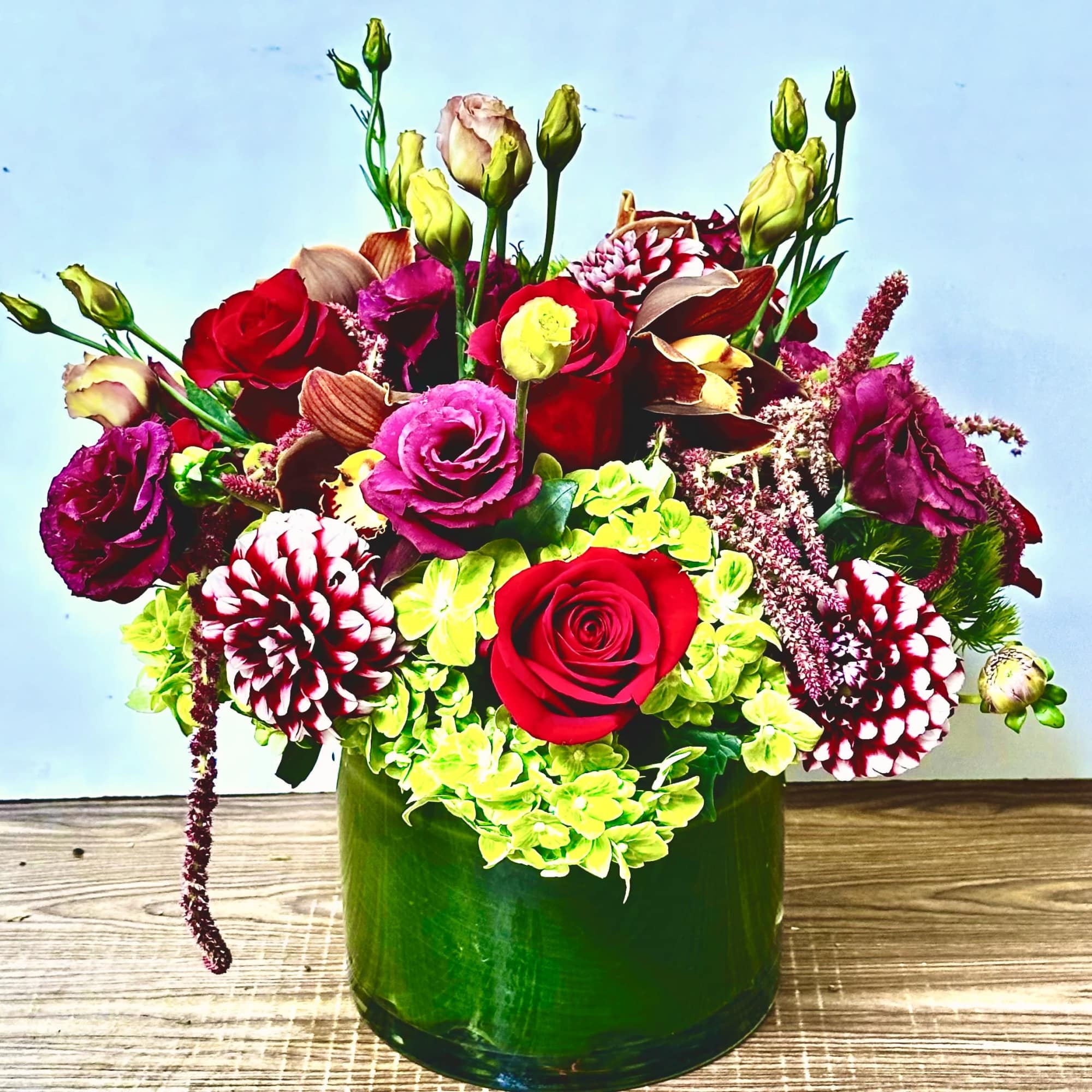 in a glass vase combinations of summer rflowers