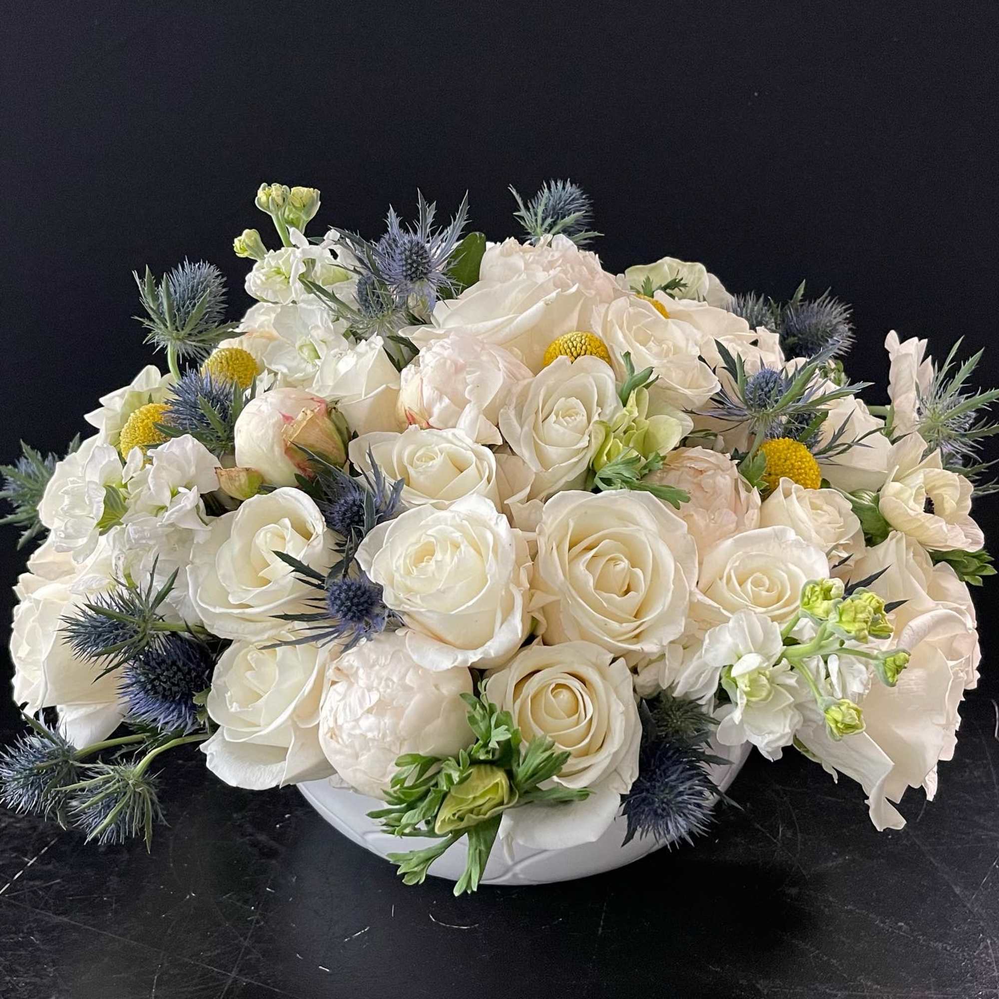 This all white with blue and yellow accent is perfect to welcome