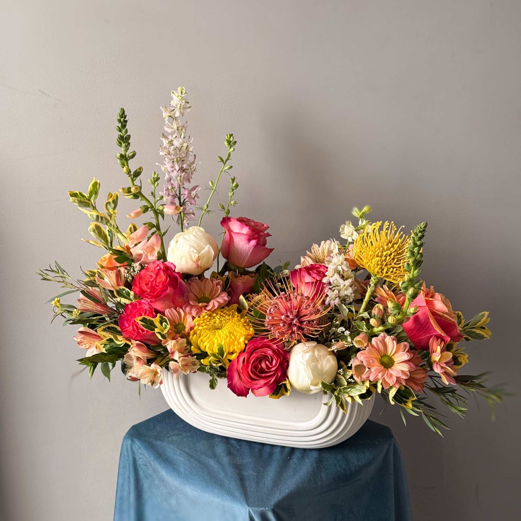 Inspired by wild blooms, the Woodland Flower Box features seasonal flowers arranged