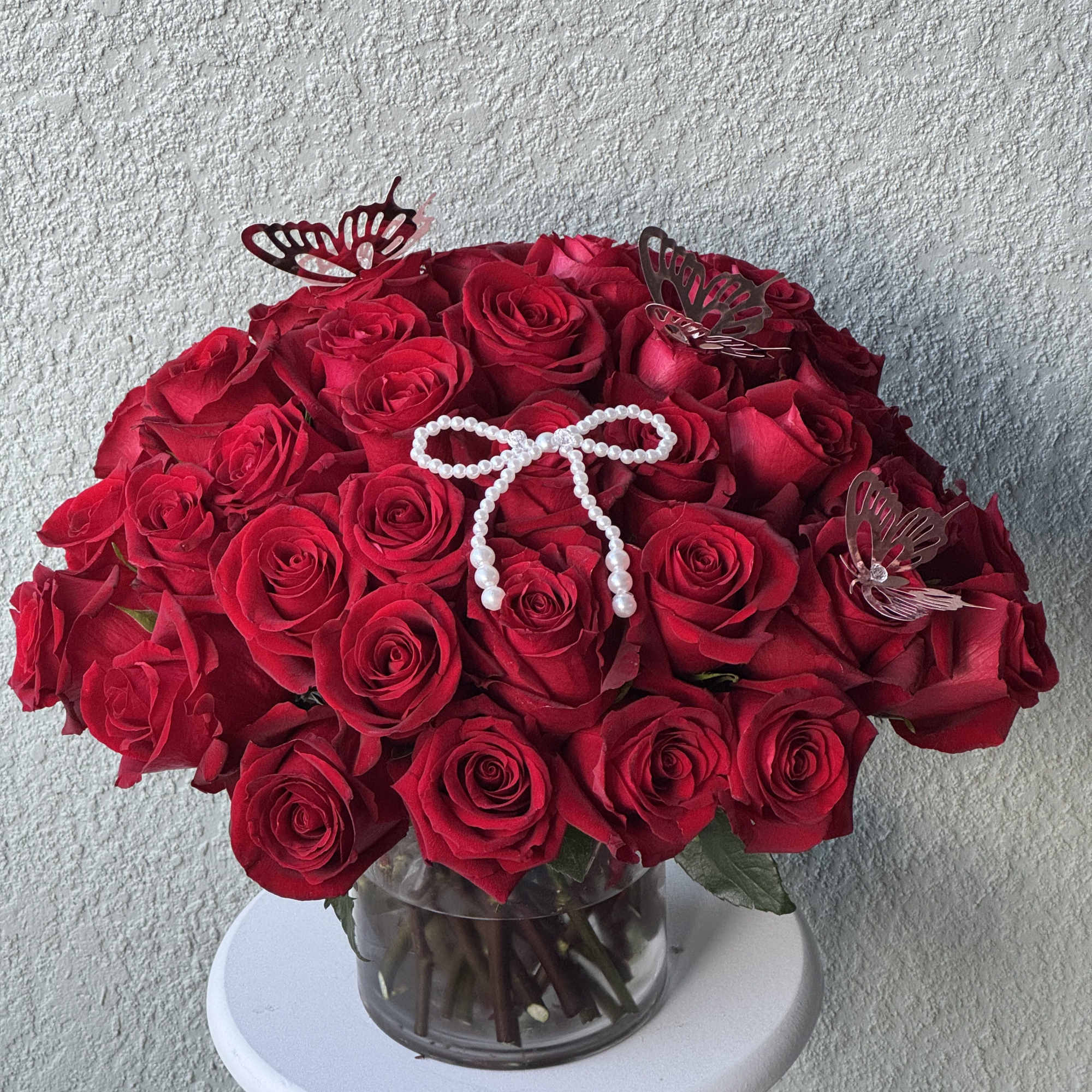 Make a bold statement with this beautifully simple design. Three Dozen Red
