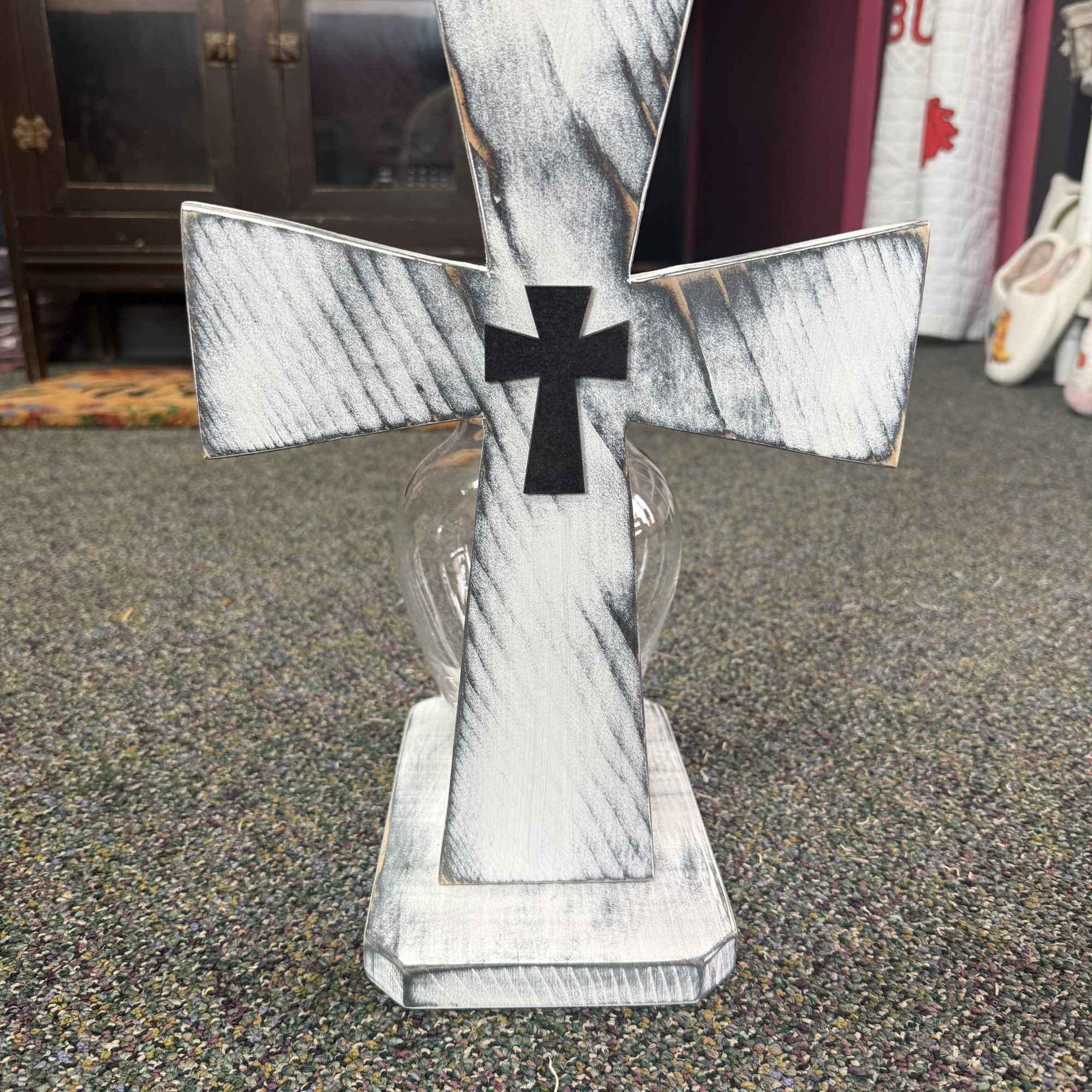 A vase full of fresh flowers, with a beautiful White Distressed Cross!