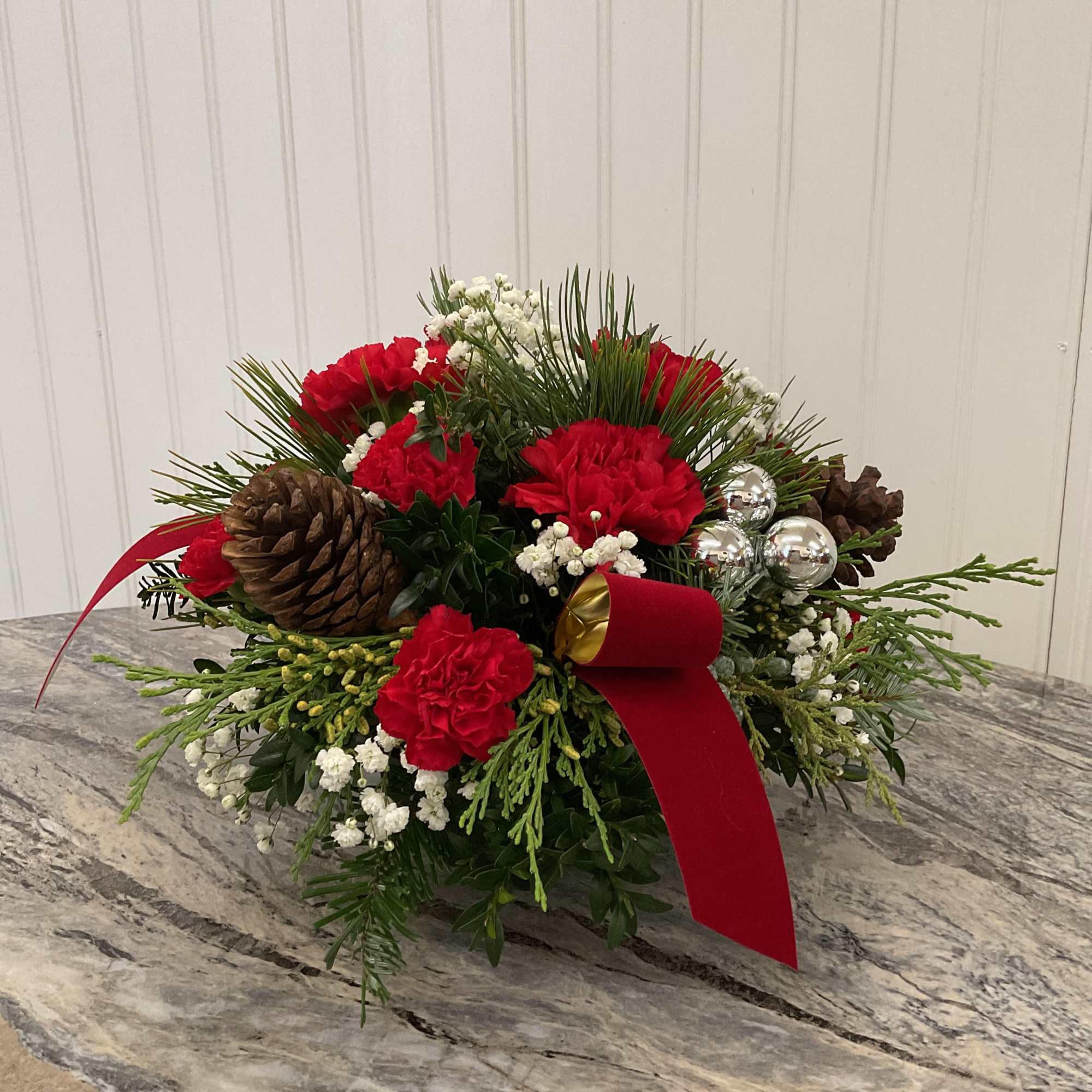 Perfect for the center of your Christmas Feast. Each arrangement is filled