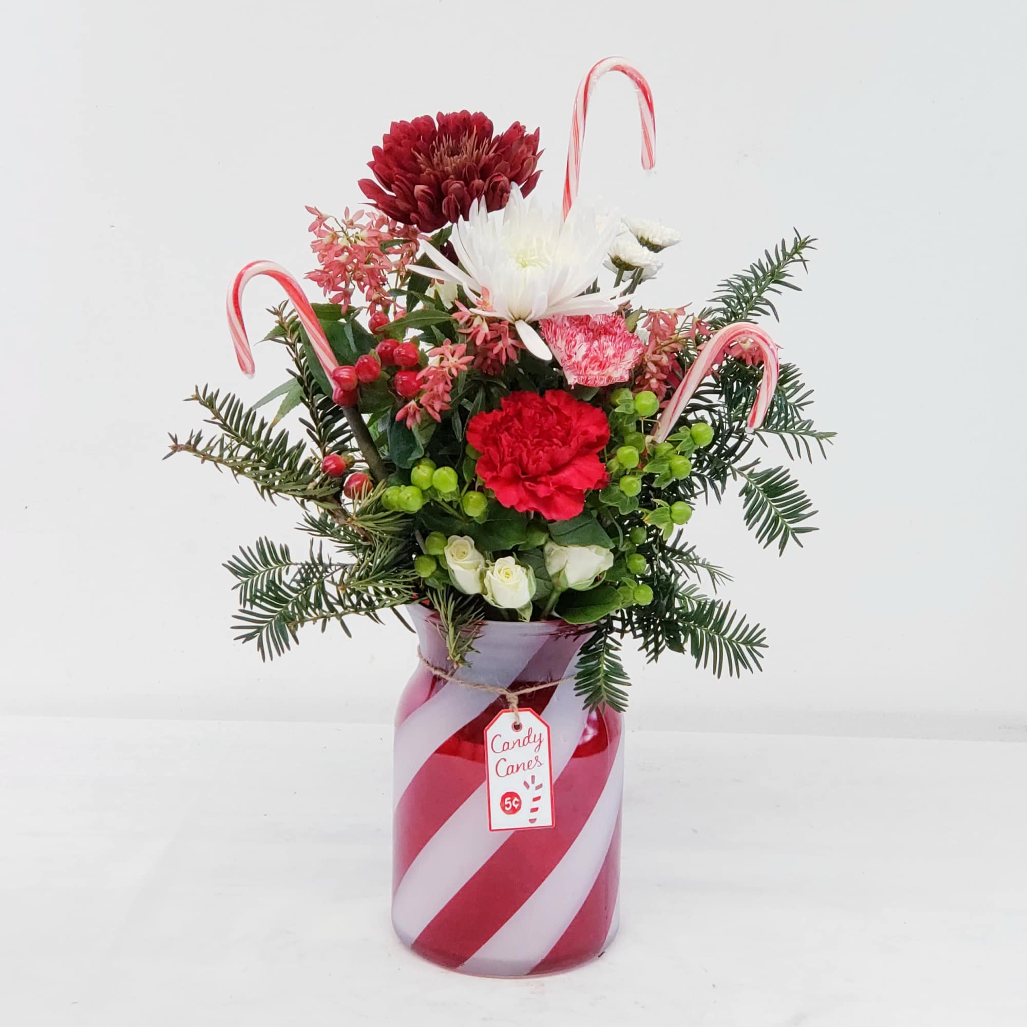 A delicious bouquet bursting with holiday spirit! Approximate overall height 24", in