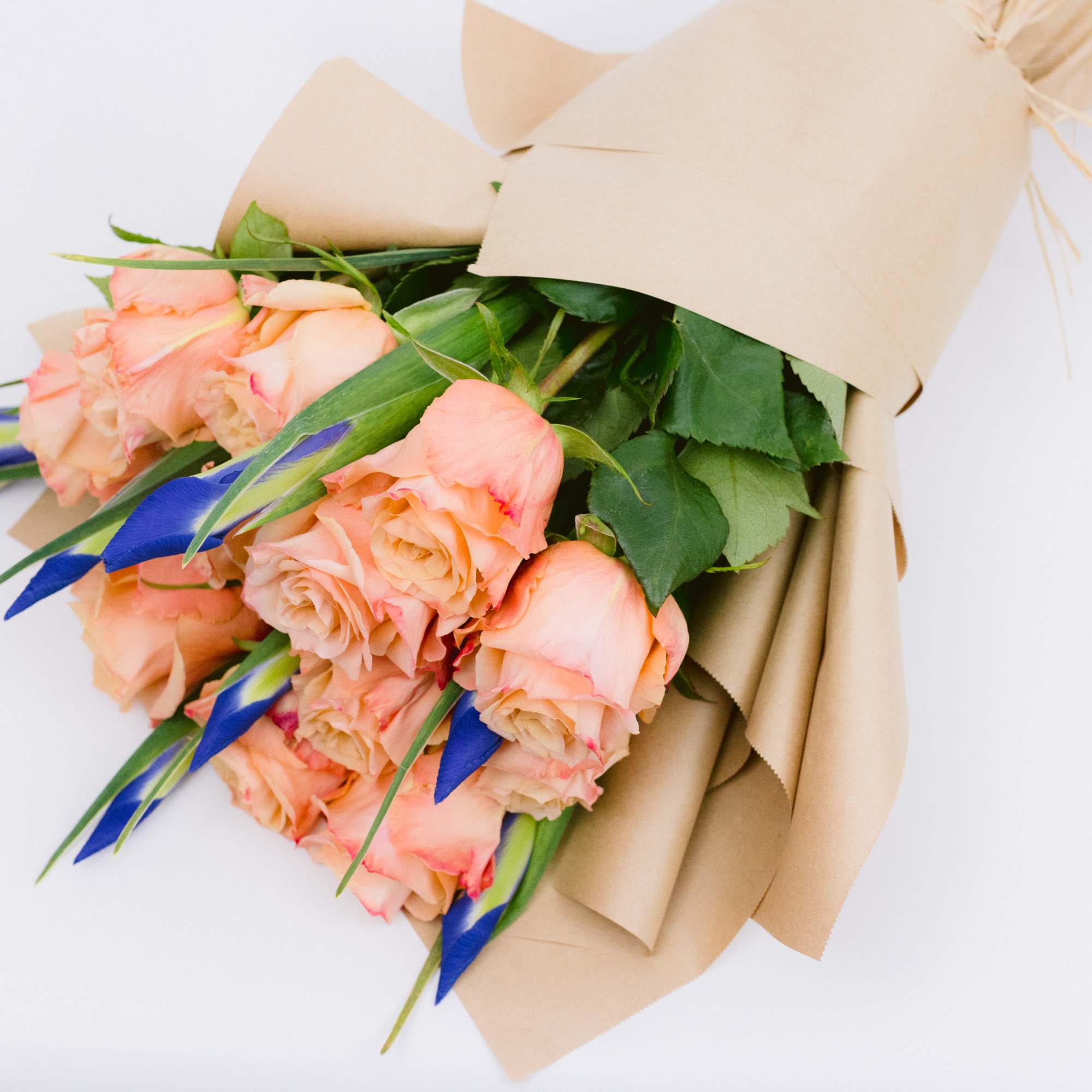 Bouquet of peach roses and irises 