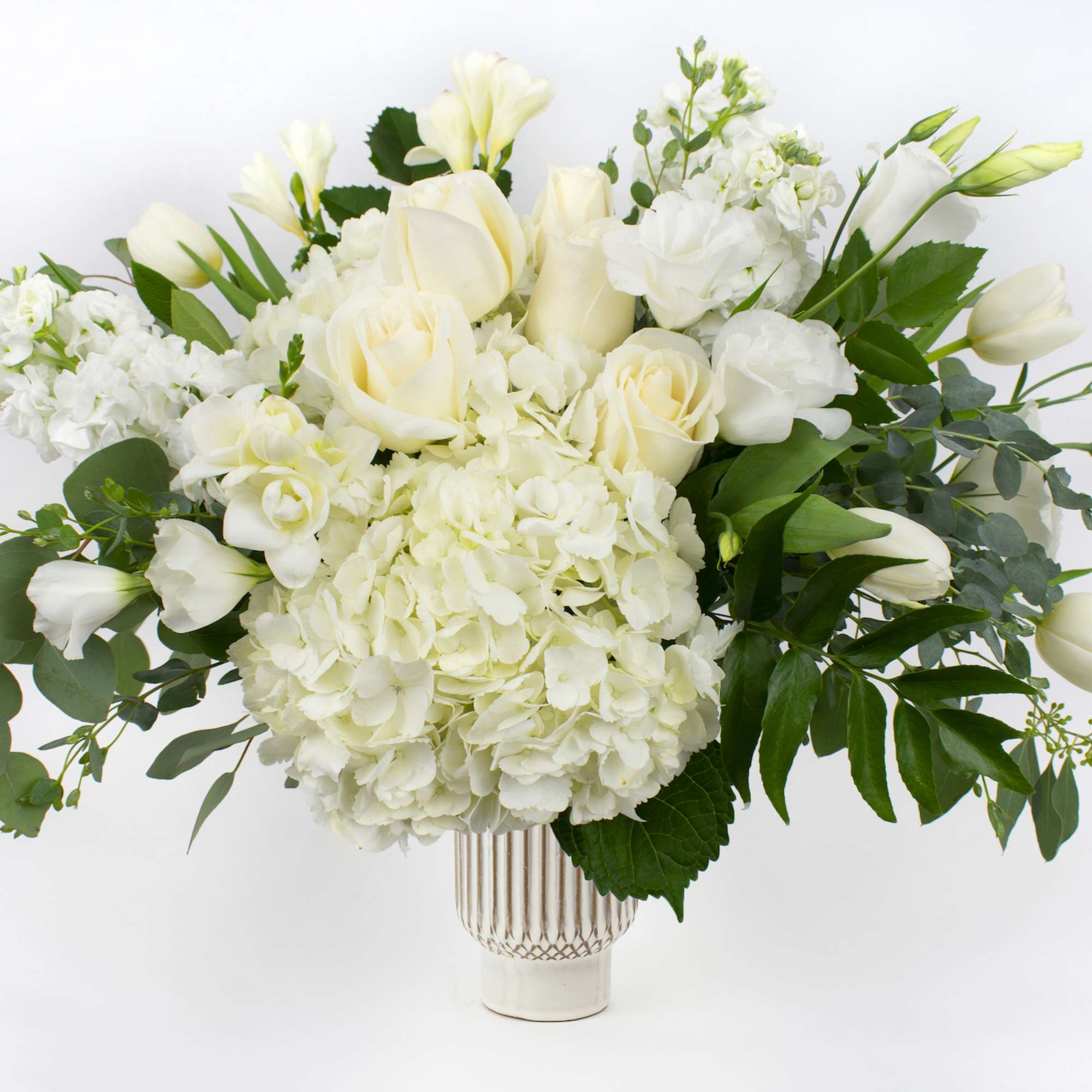 SIMPLY GORGEOUS VASE OF ALL WHITE FLOWERS

Simple, elegant, stunning. This striking vase