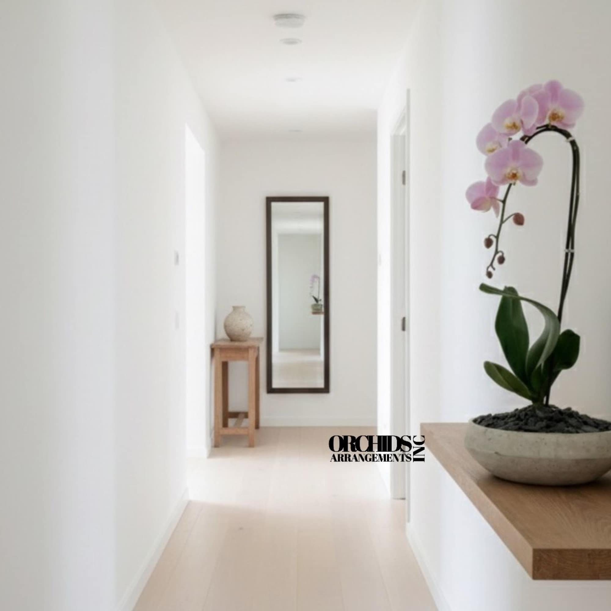 A high quality Single pink orchid arrangement with a vase 9" D