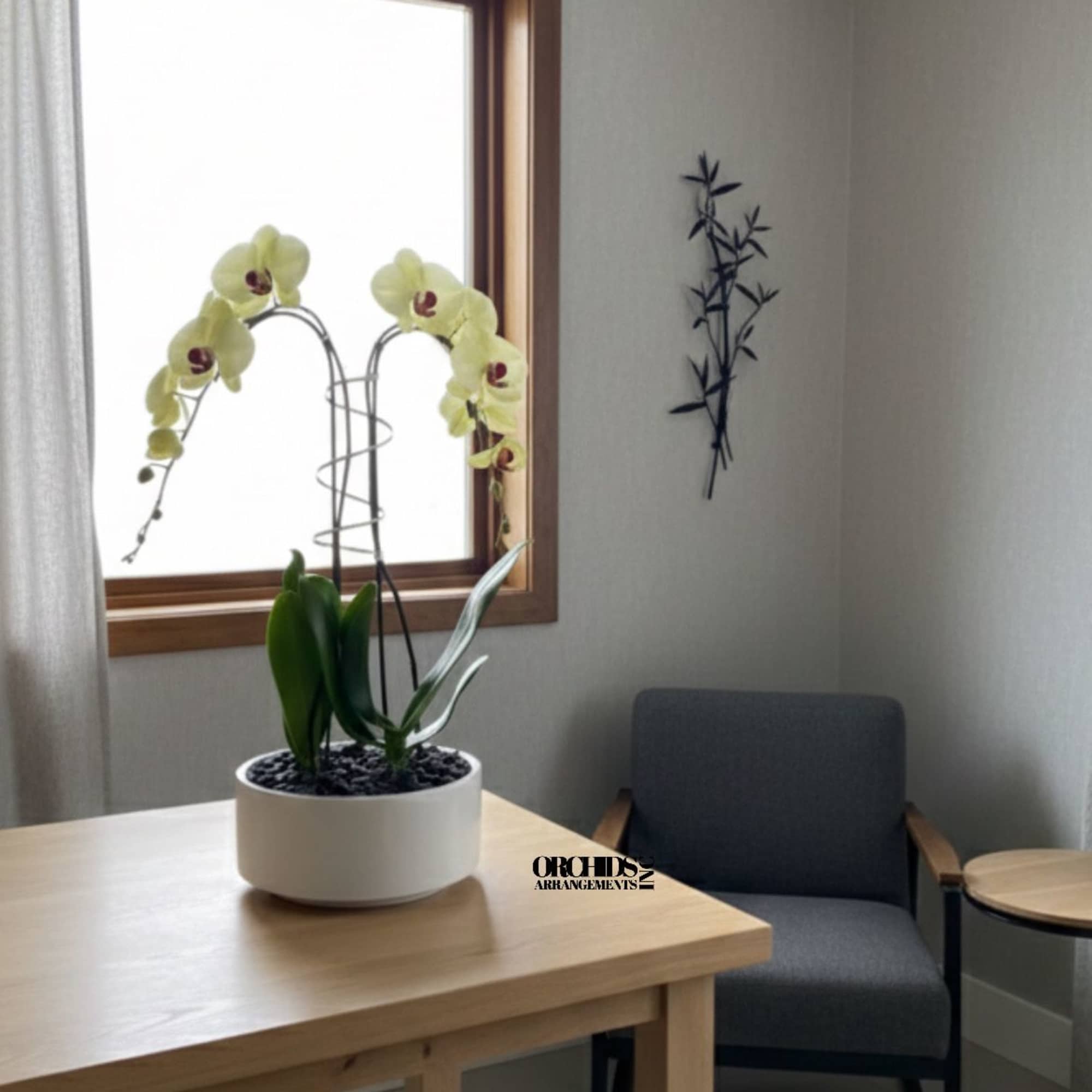 A high quality Double Yellow orchid arrangement with a vase 9" D