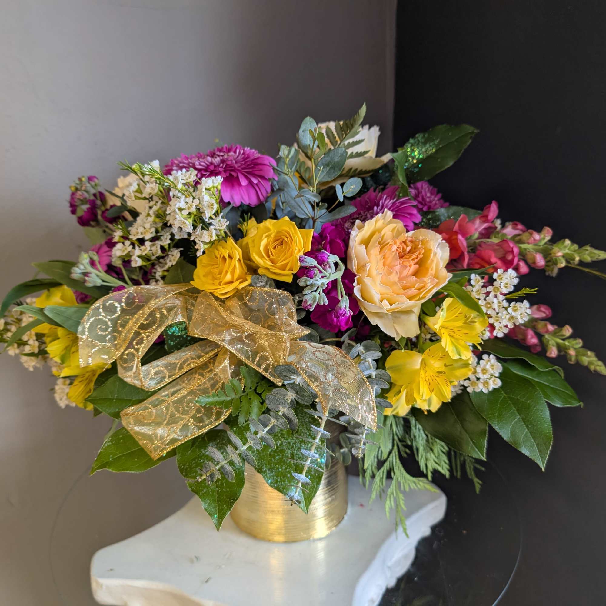 A beautifully selected bunch of the freshest flowers in a vase uniquely