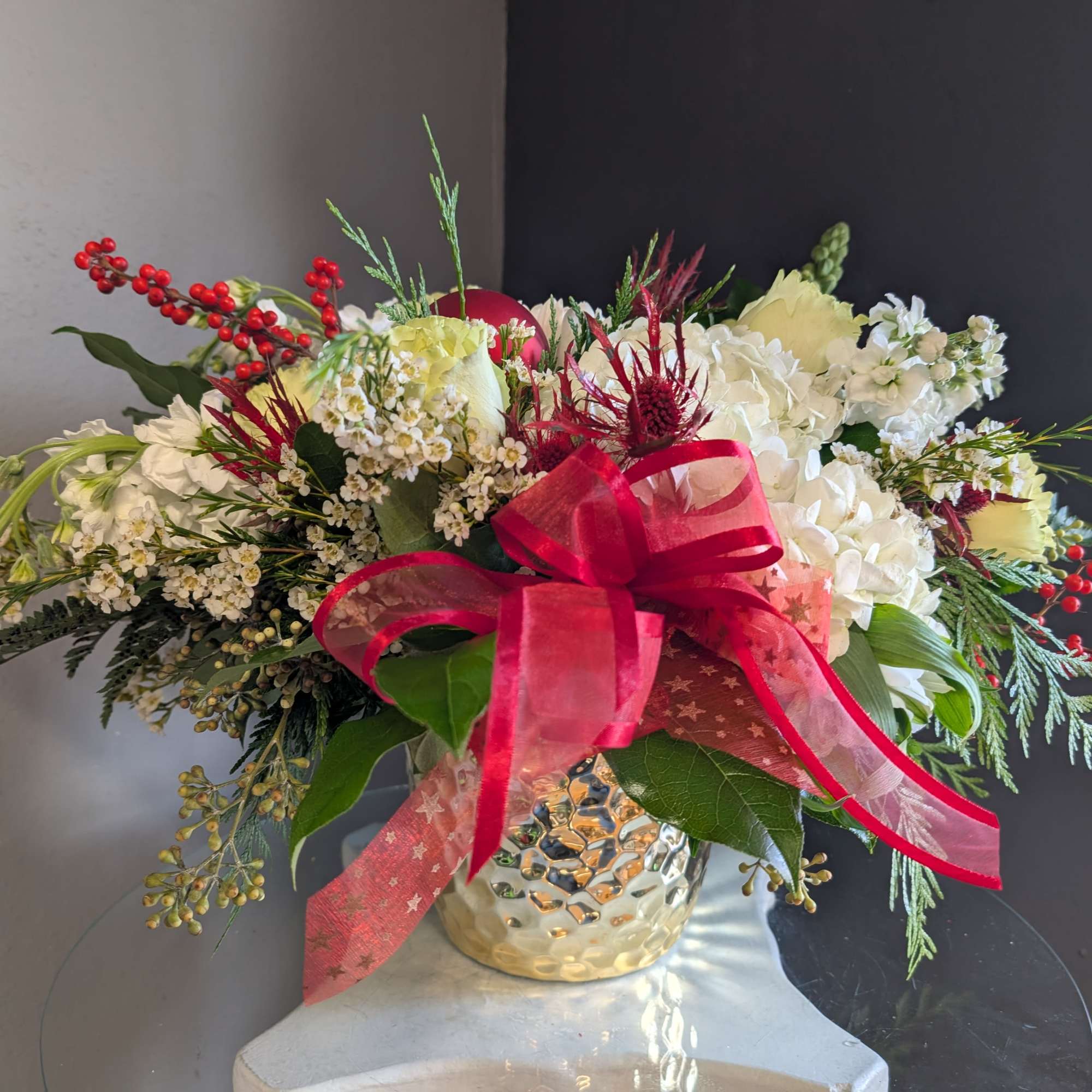 A beautifully selected bunch of the freshest flowers in a vase uniquely